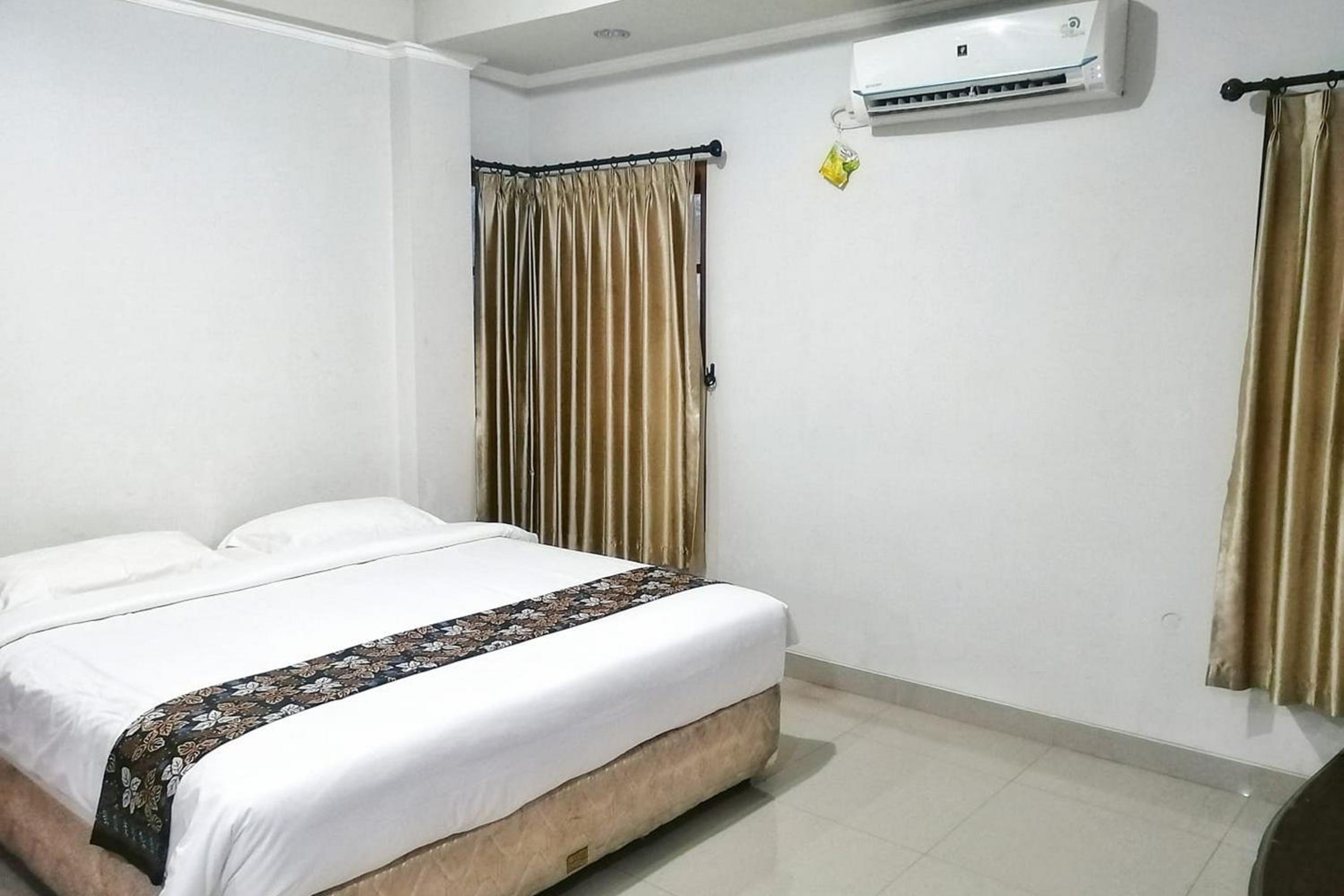 Deluxe Room - Photo 6