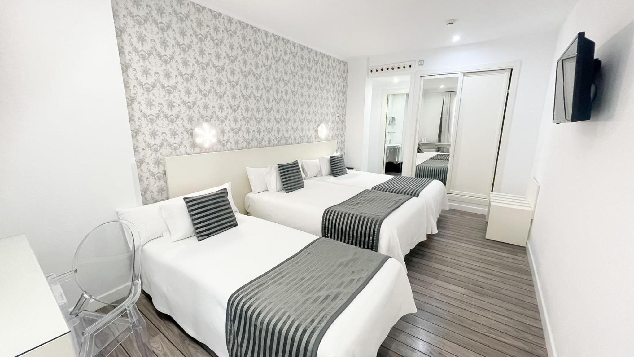 Habitación Doble con cama supletoria (2 adultos + 1 niño)