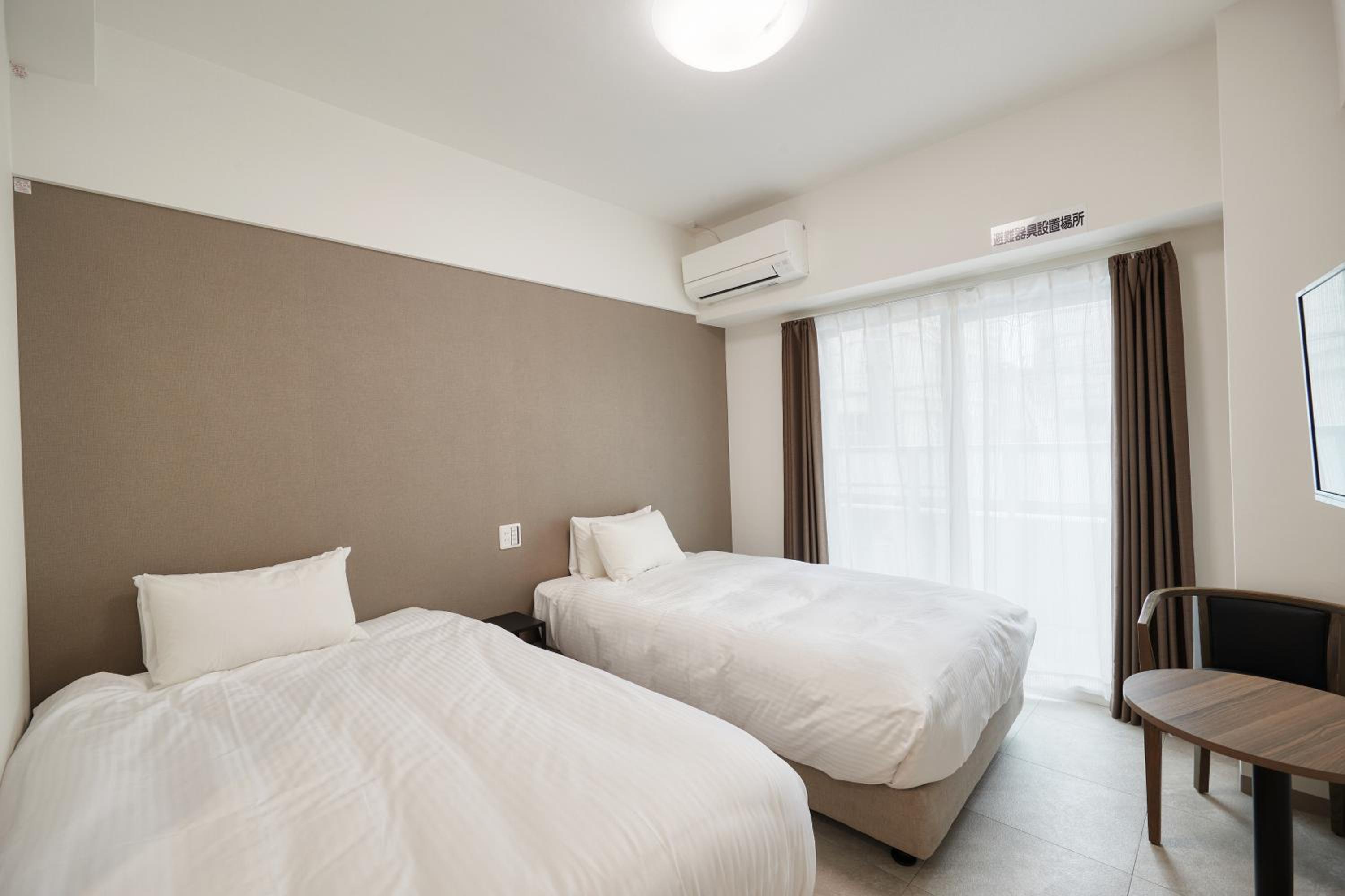 Twin Room - Photo 1