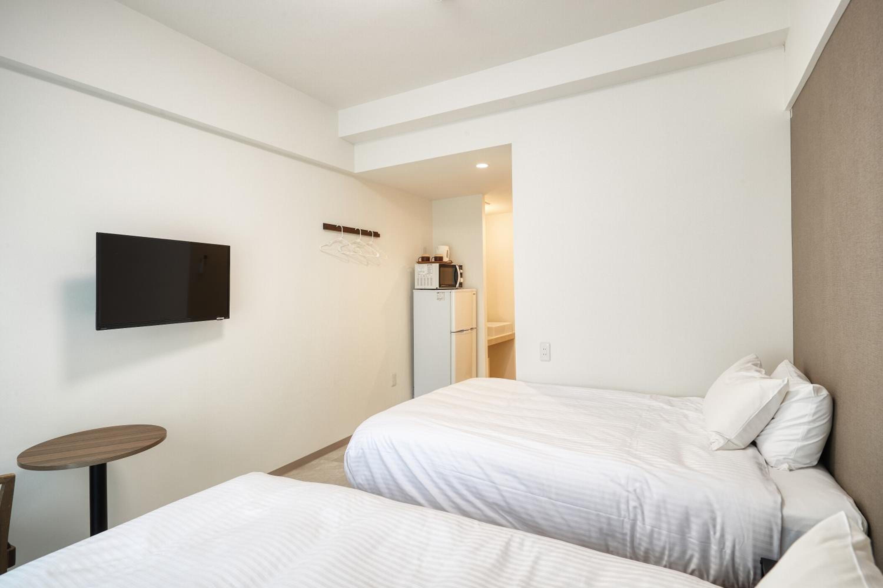 Twin Room - Photo 10