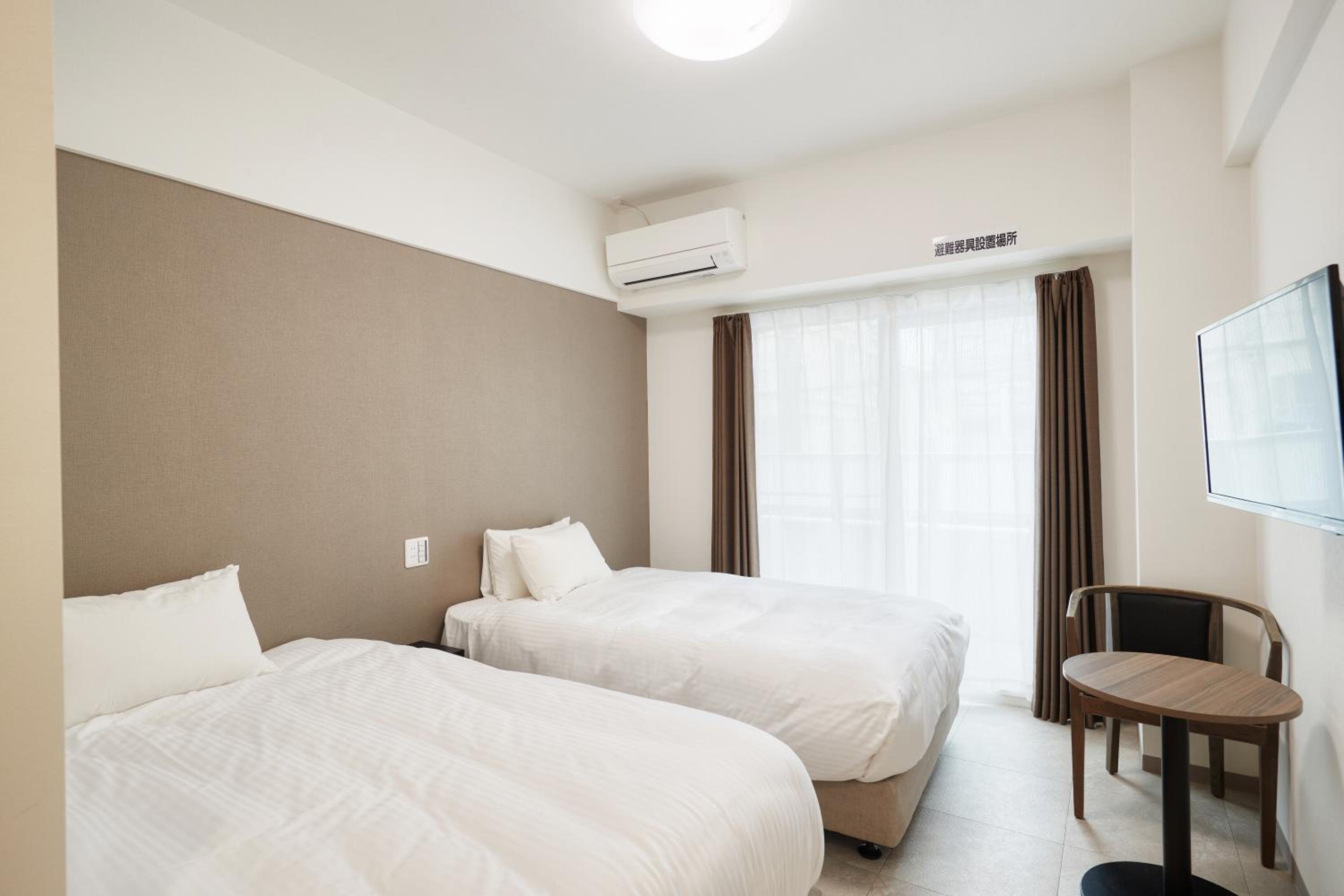 Twin Room - Photo 7