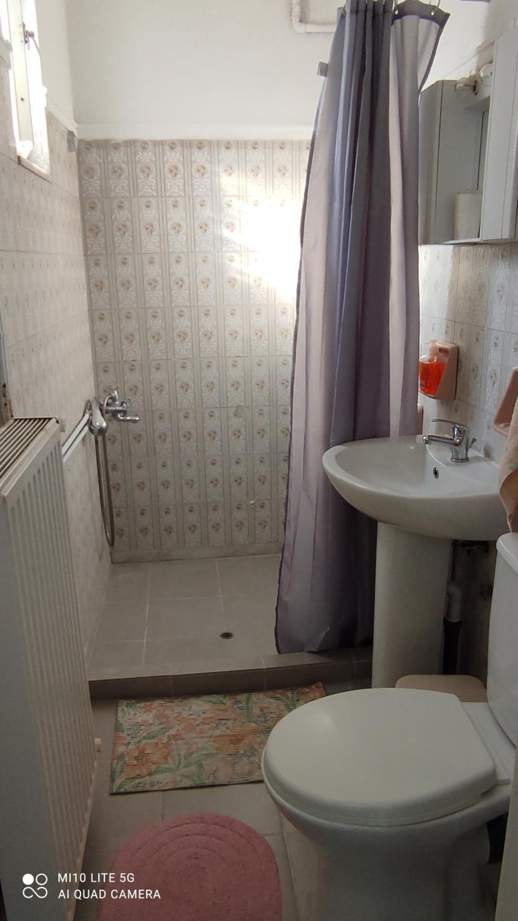 Three-Bedroom Apartment - Photo 12