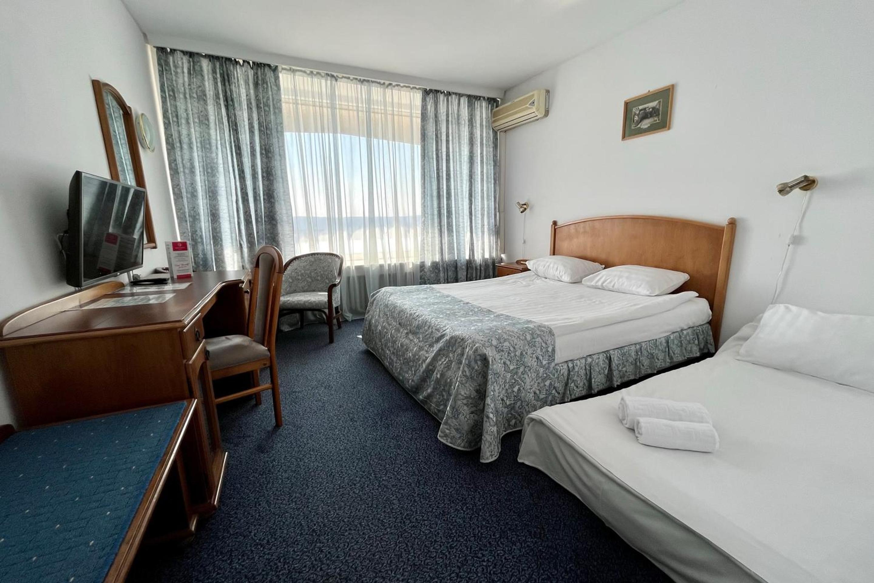 Standard Double Room with extendable armchair