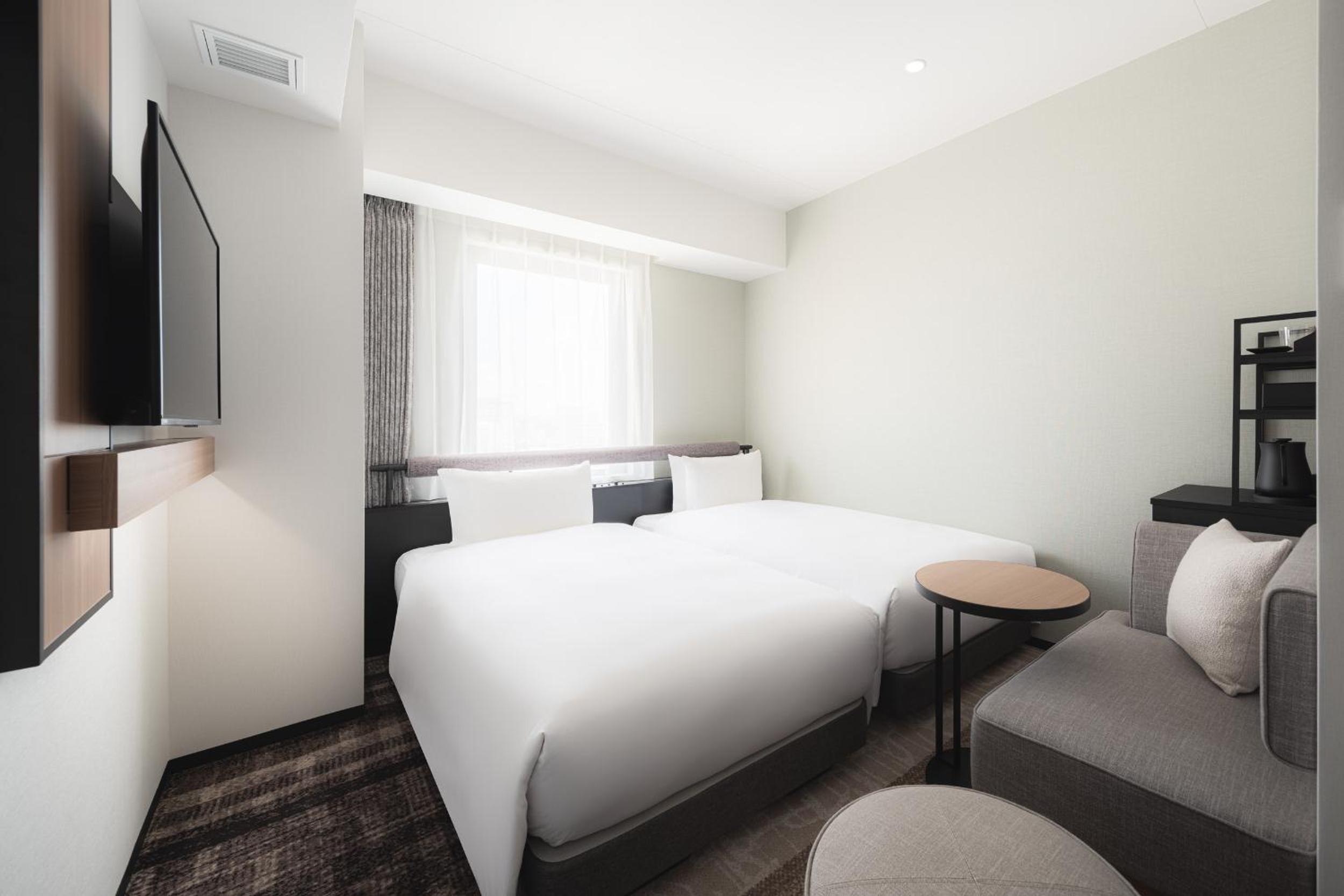 Standard Twin Room - Photo 4