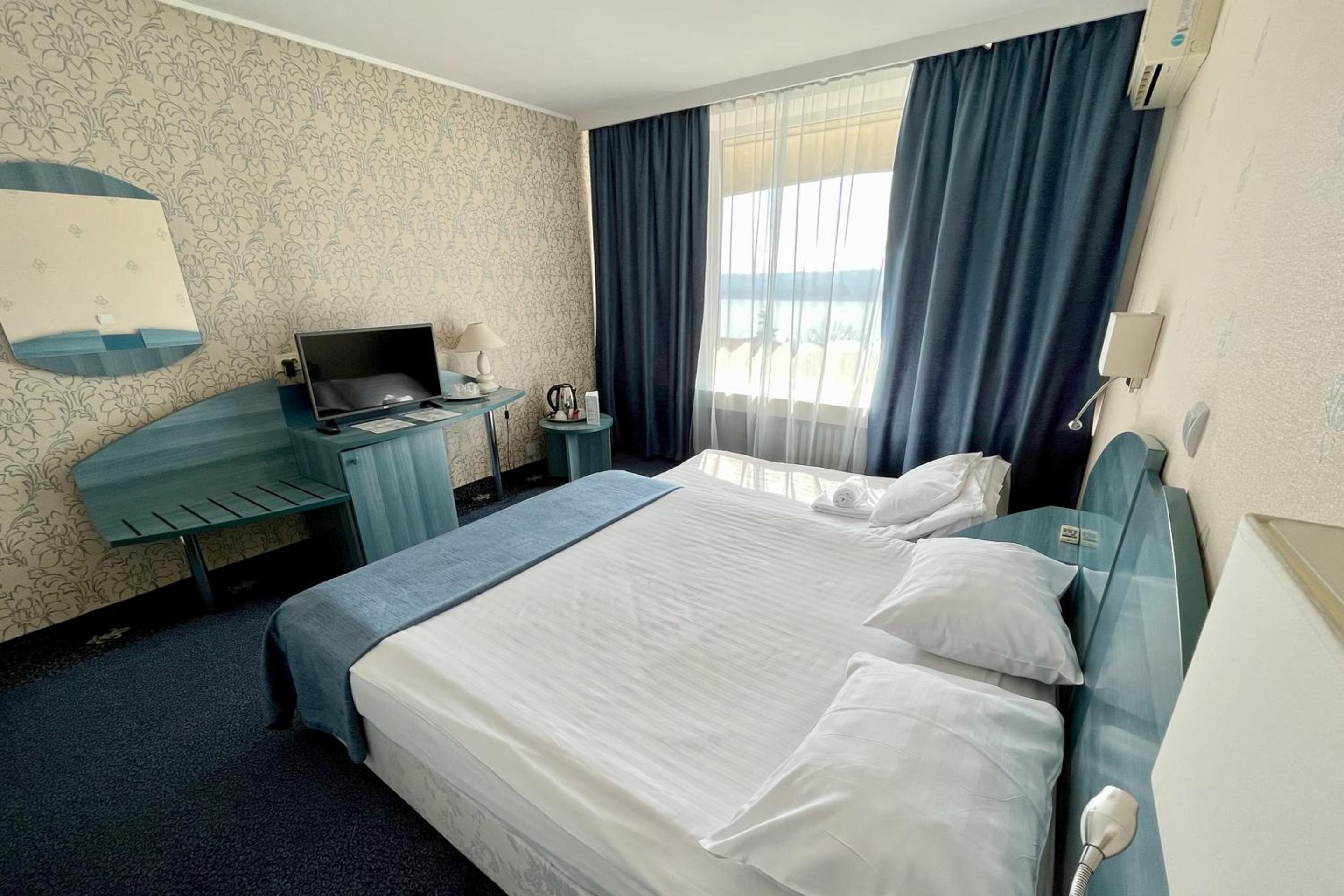 Superior Double Room with extendable armchair and River View