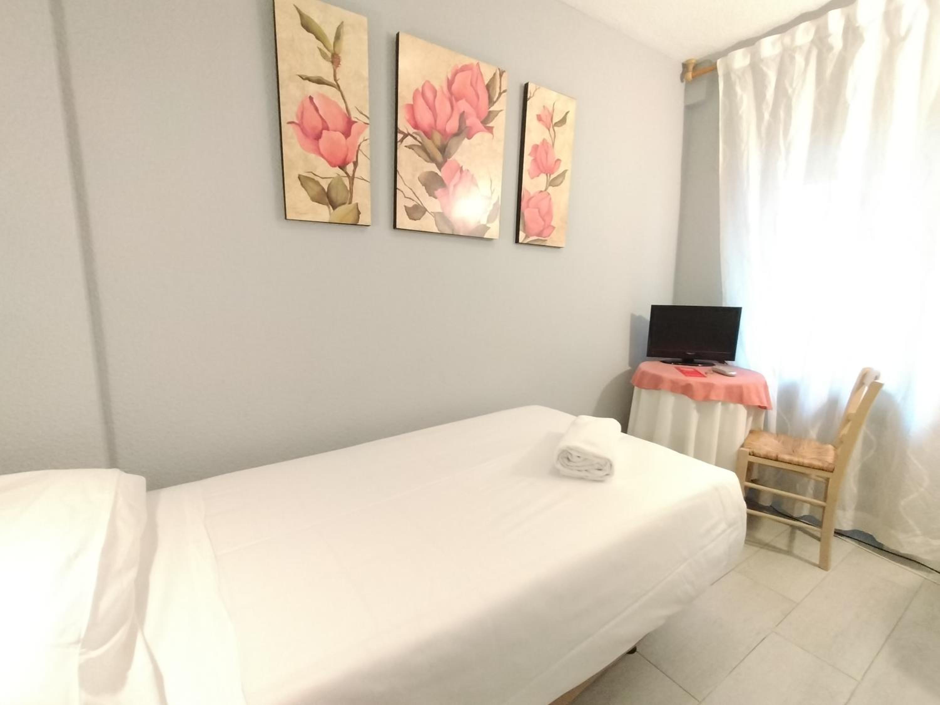 Habitación individual con baño compartido