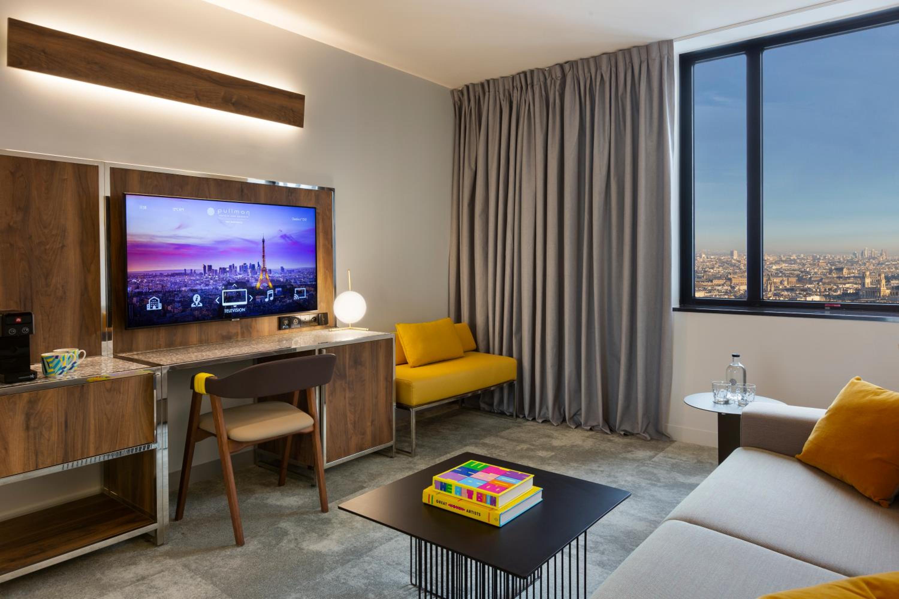 Deluxe Suite with one King Size Bed and one Sofa with City View