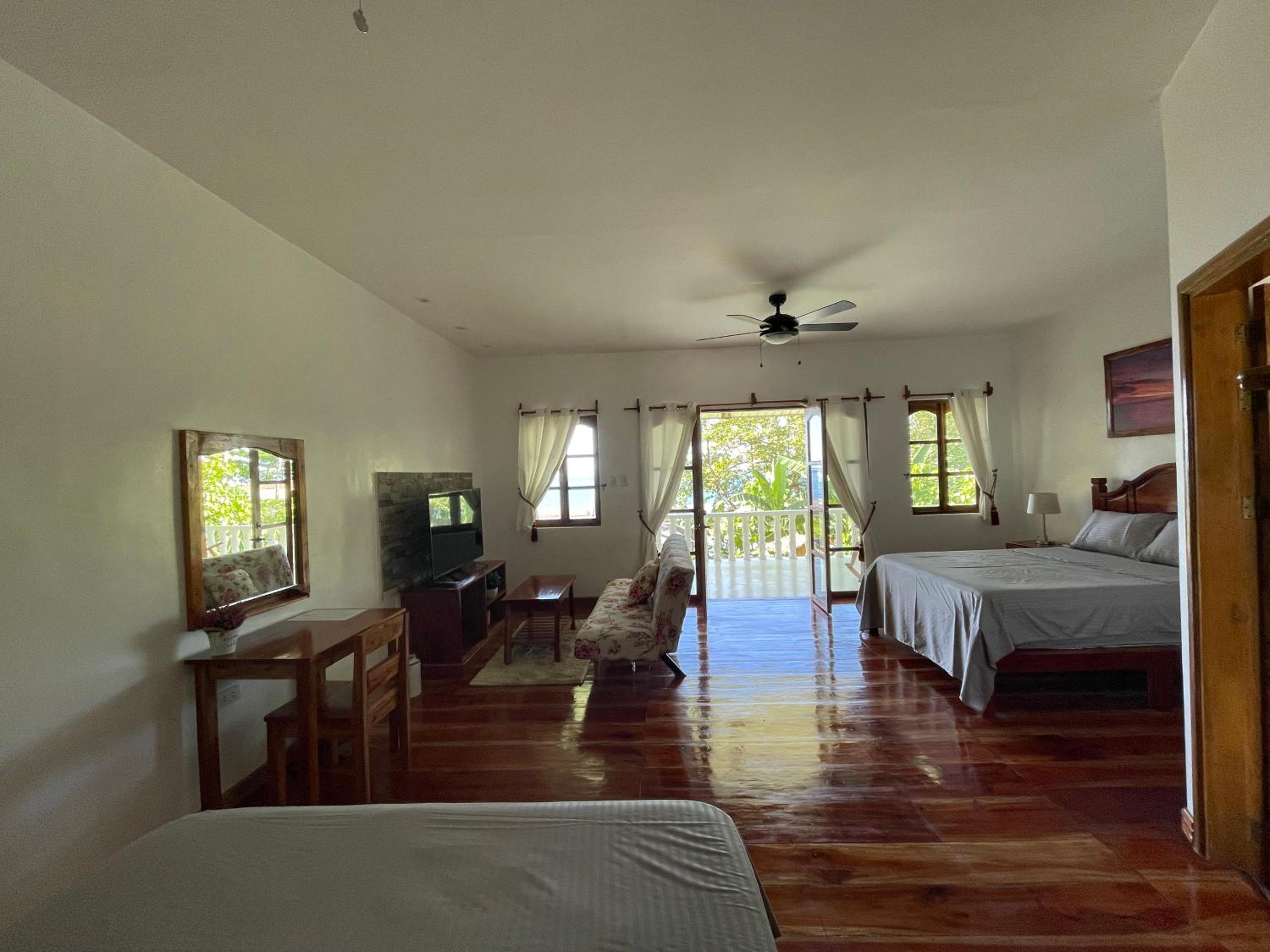 Family Room with Balcony - Photo 3