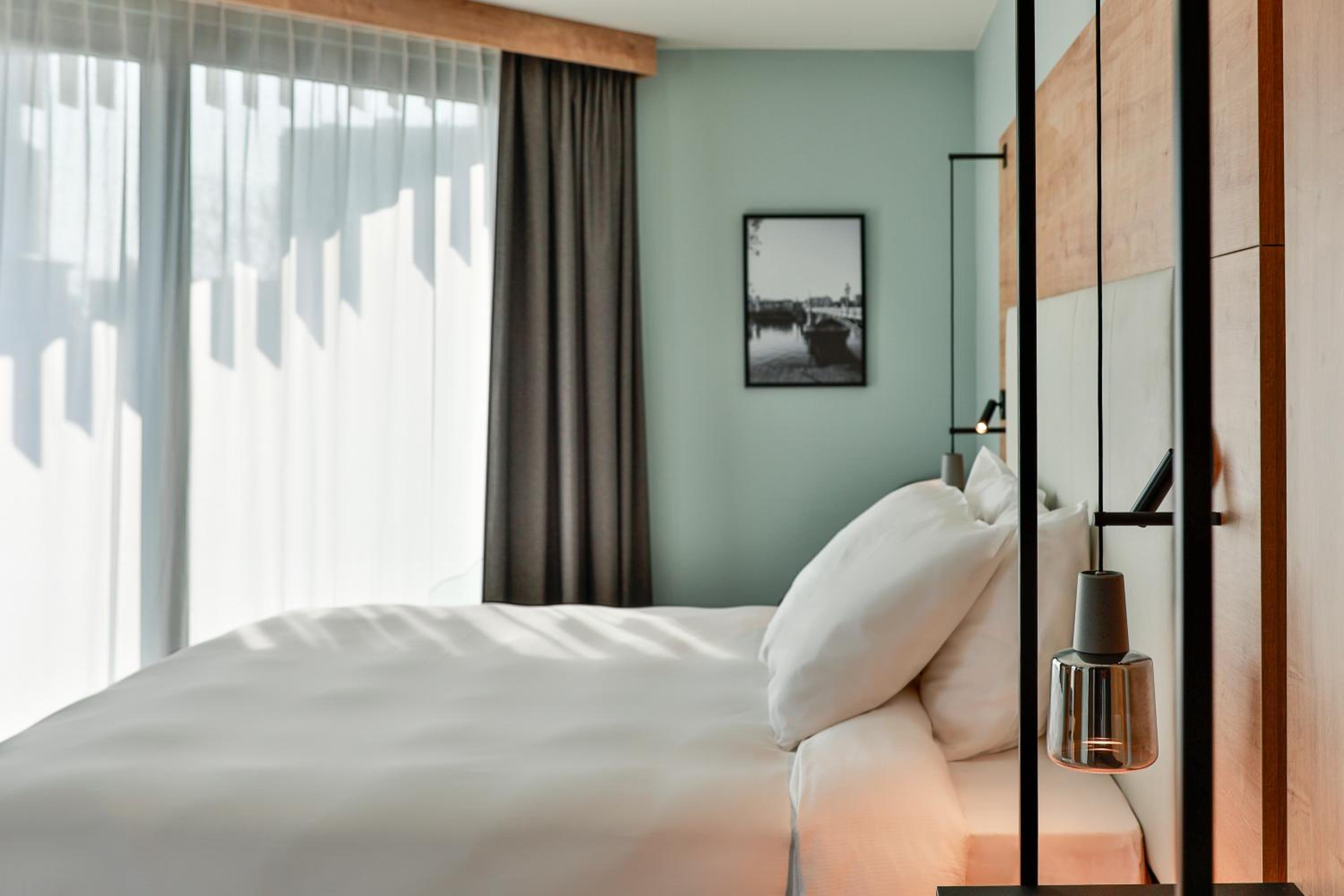 Junior Suite with Balcony and Kitchenette - Photo 1