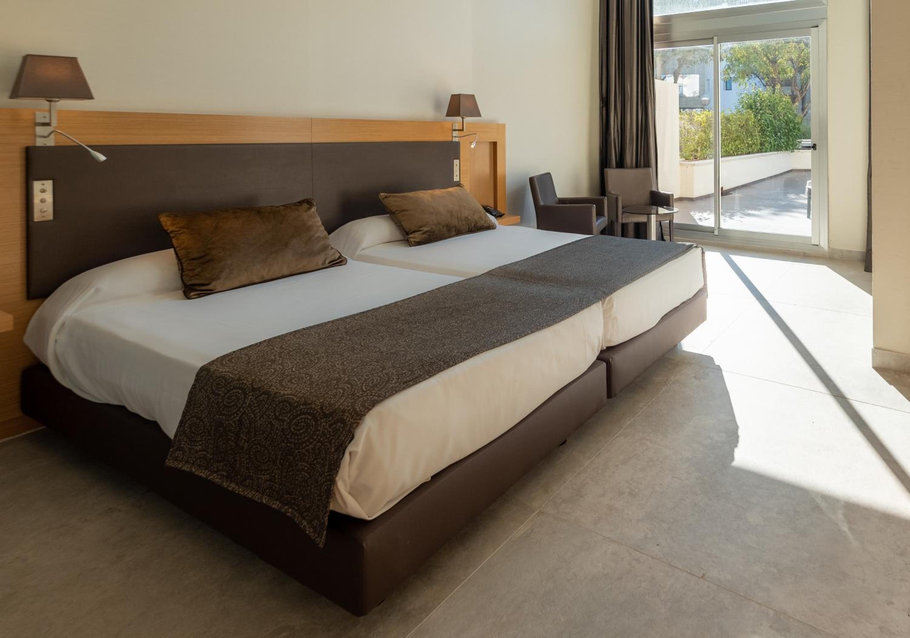 Habitación Dúplex (2 Adultos + 1 Niño)