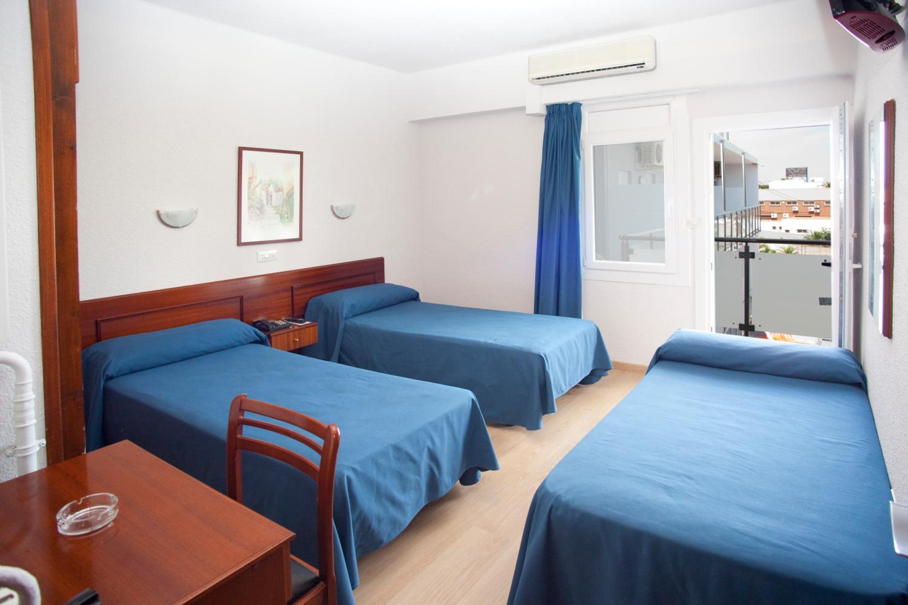 Triple Room (2 Adults + 1 Child) photo 2