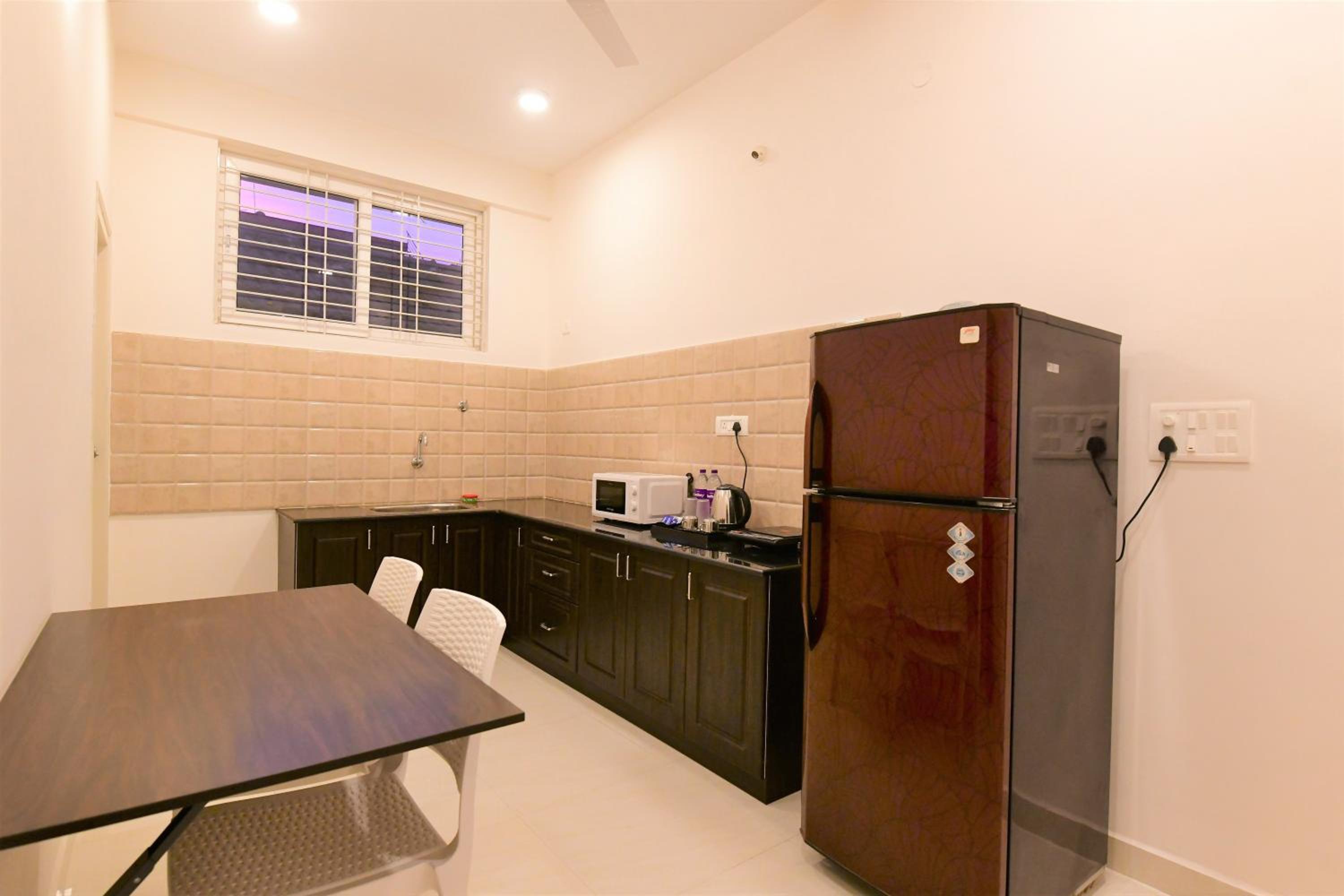Two-Bedroom Apartment - Photo 32
