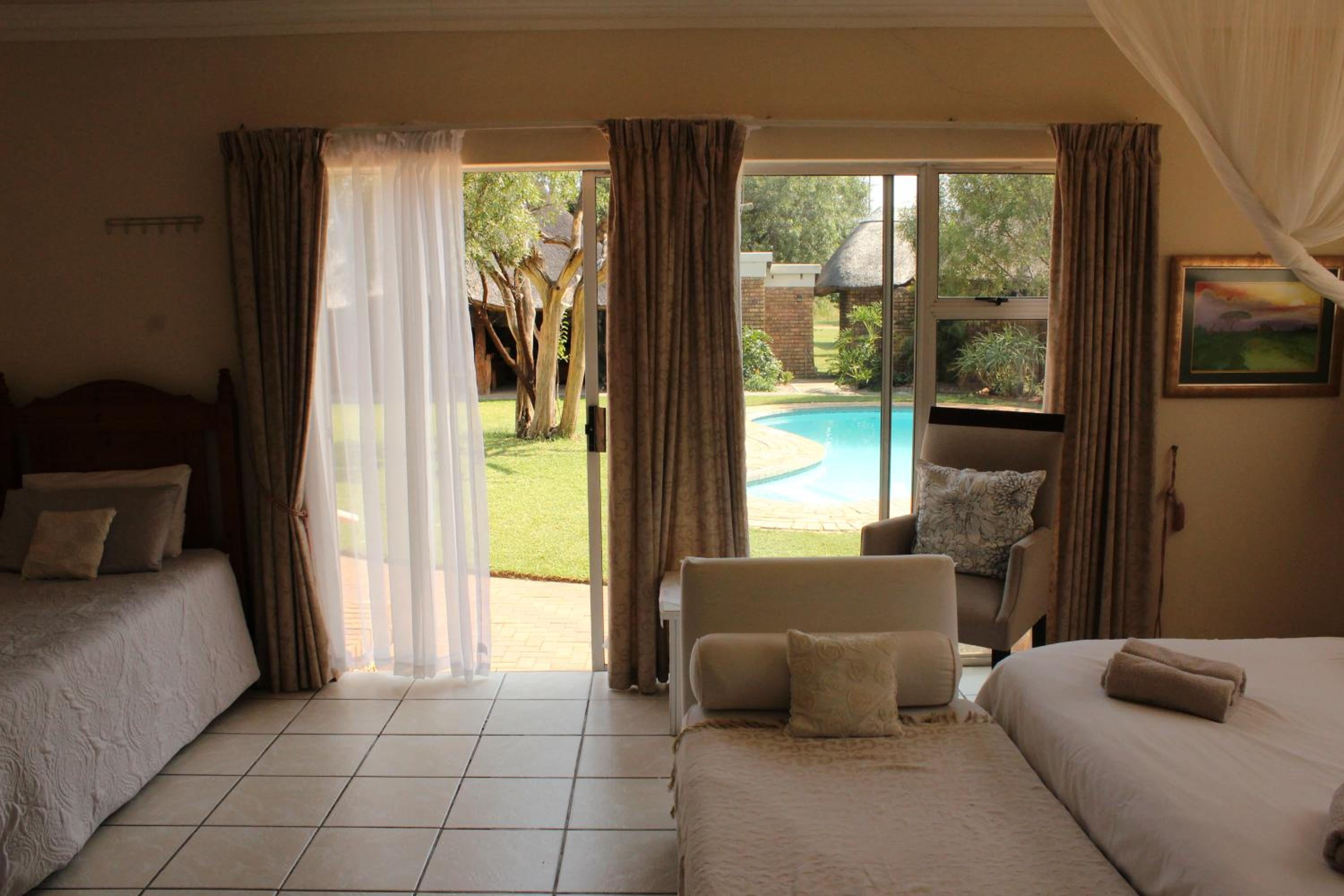 Deluxe Double Room (2 Adults + 1 Child) photo 2