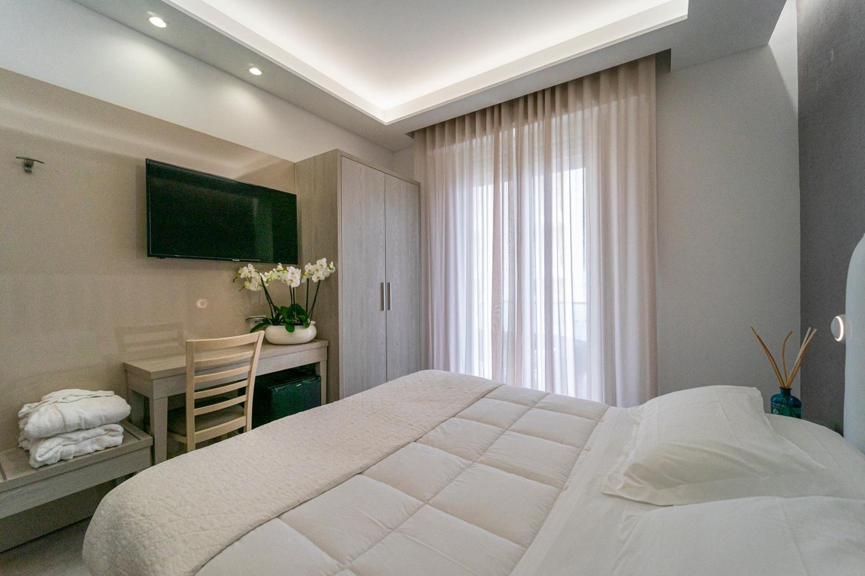 Deluxe Triple Room - Photo 23