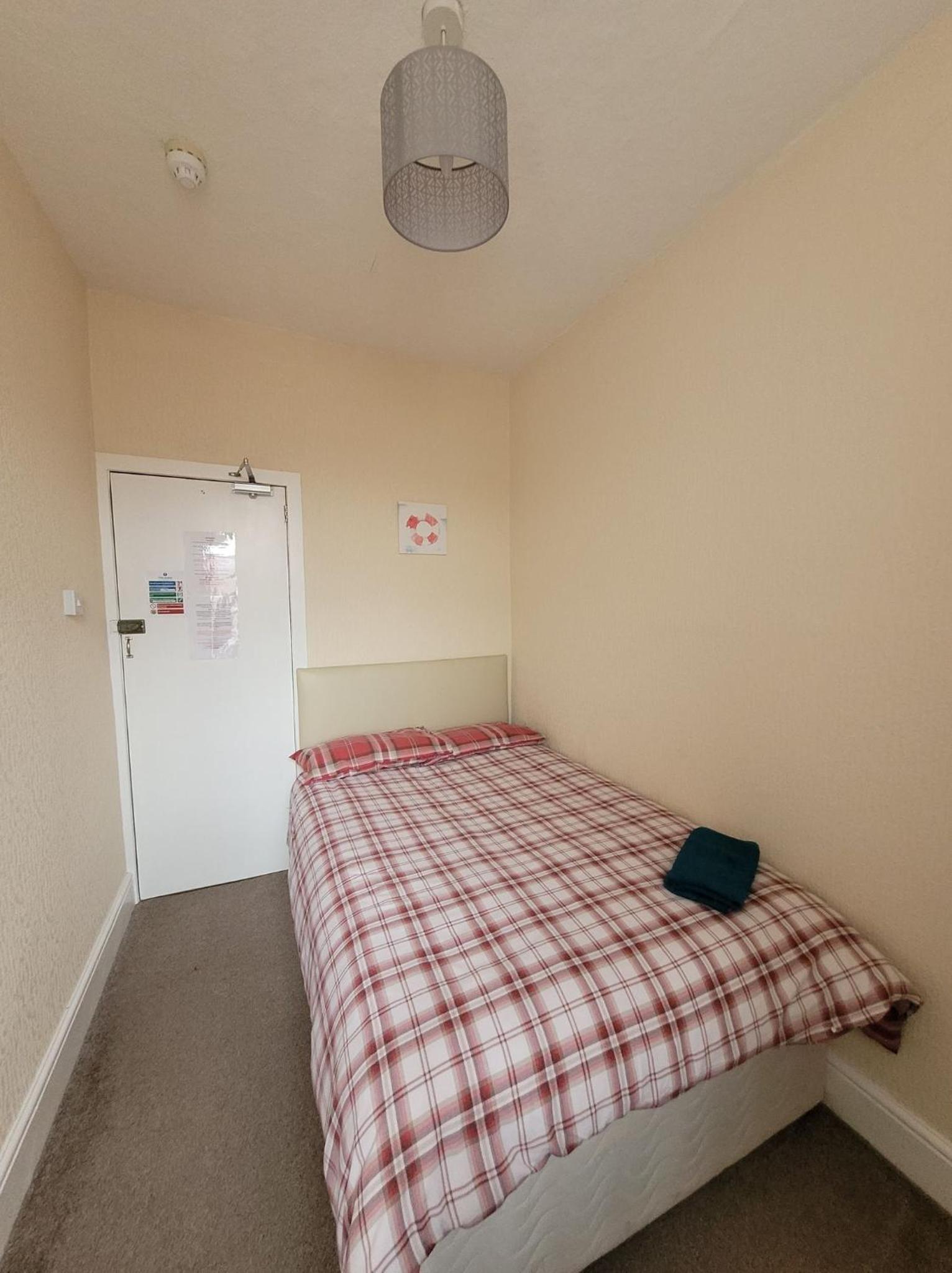 Single Room with Shared Shower and Toilet