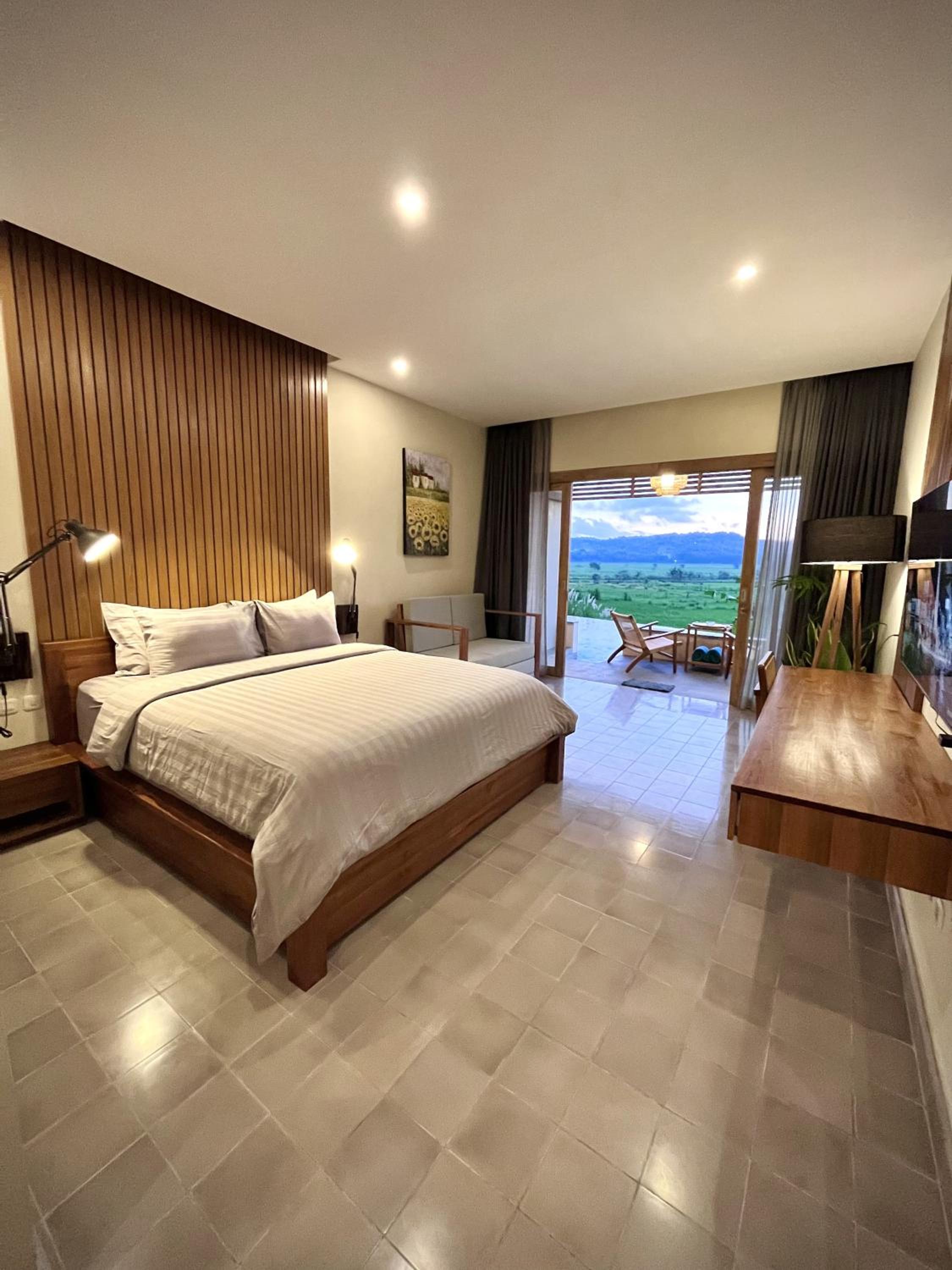 Deluxe Room - Photo 1