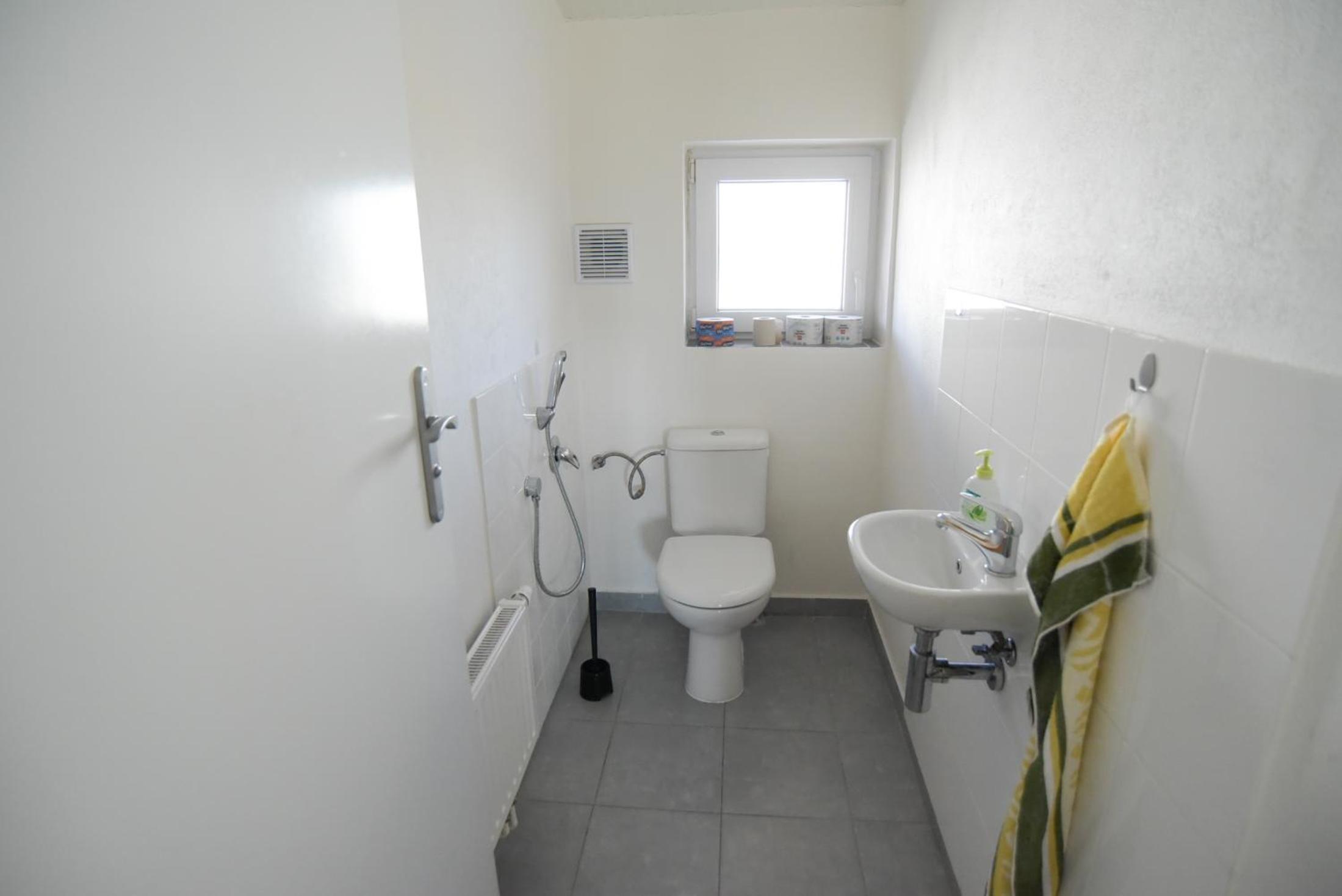 Three-Bedroom Apartment - Photo 30
