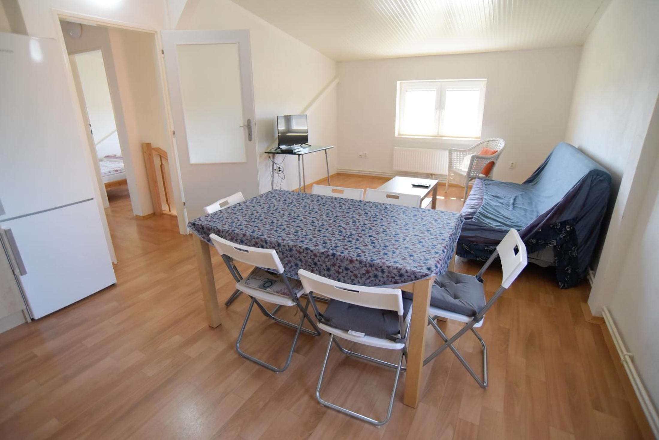 Three-Bedroom Apartment - Photo 33