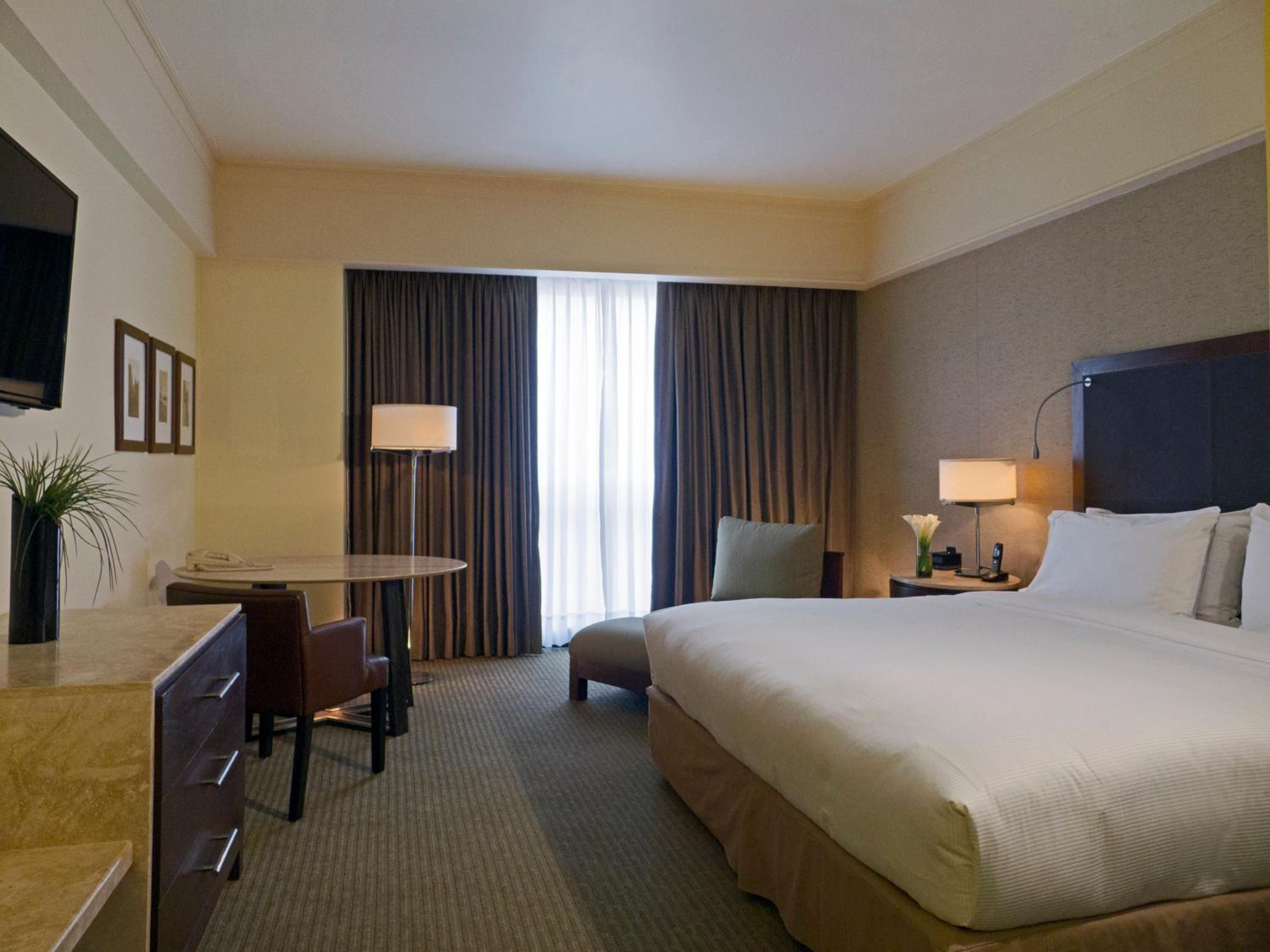 Deluxe King Room - Photo 7