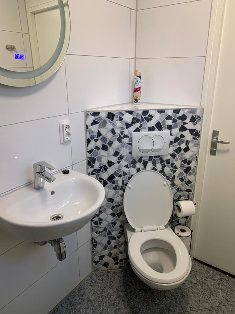 Three-Bedroom House - Photo 16