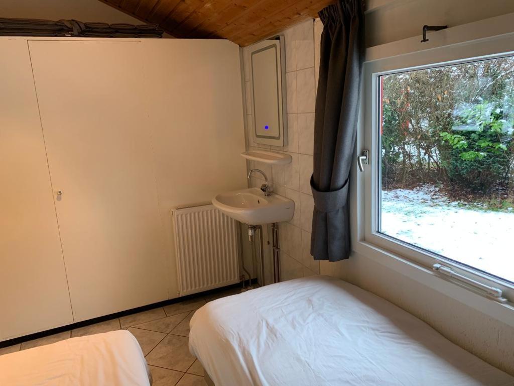 Three-Bedroom House - Photo 20