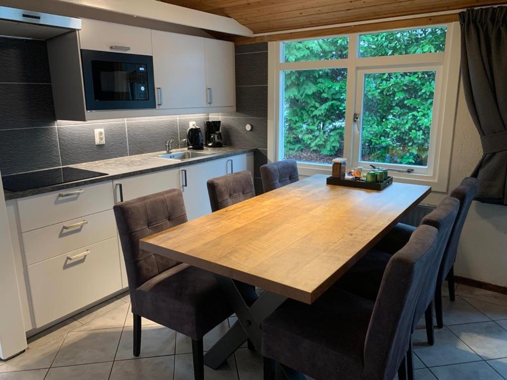 Three-Bedroom House - Photo 25