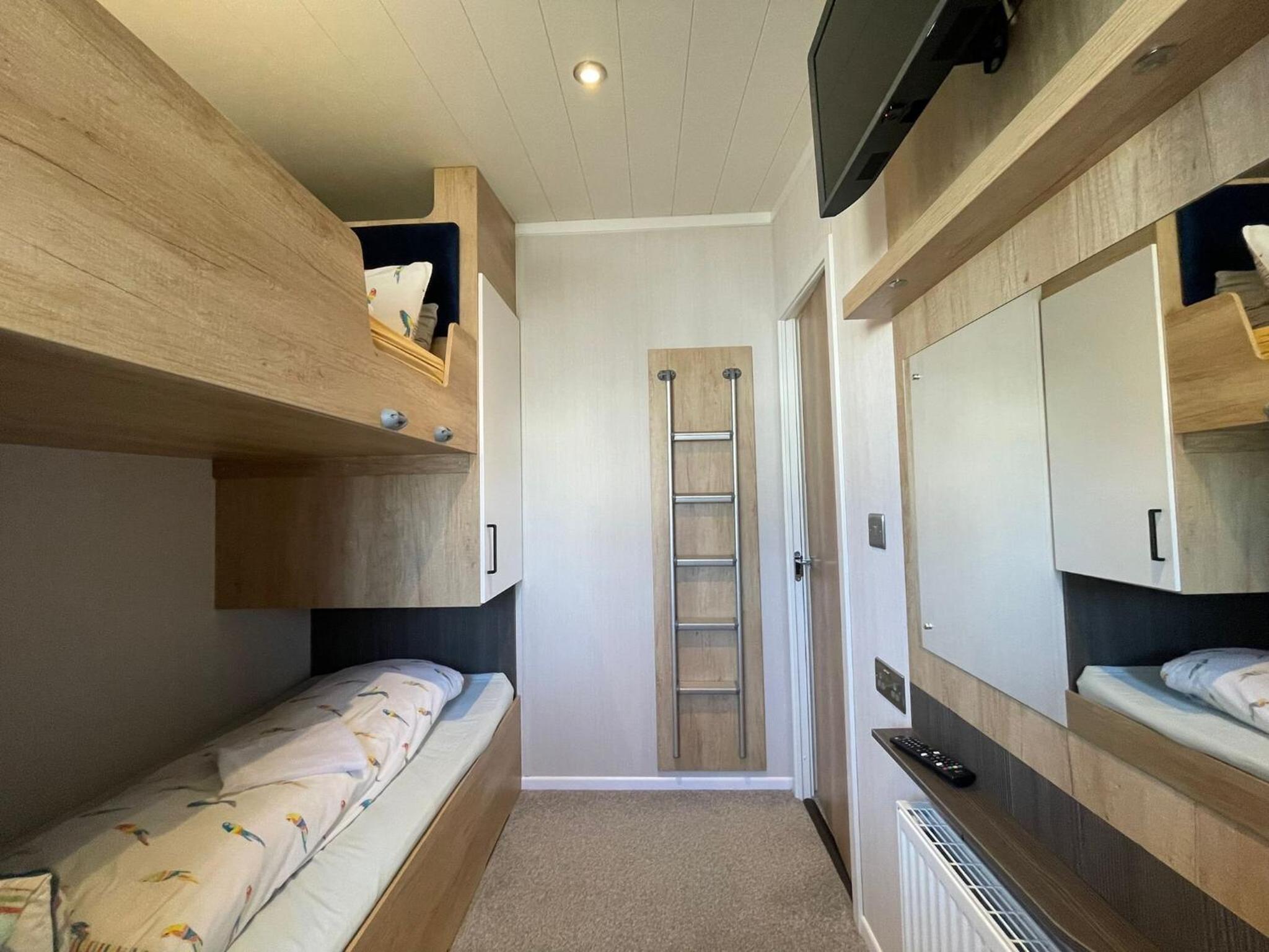Three-Bedroom Apartment - Photo 25