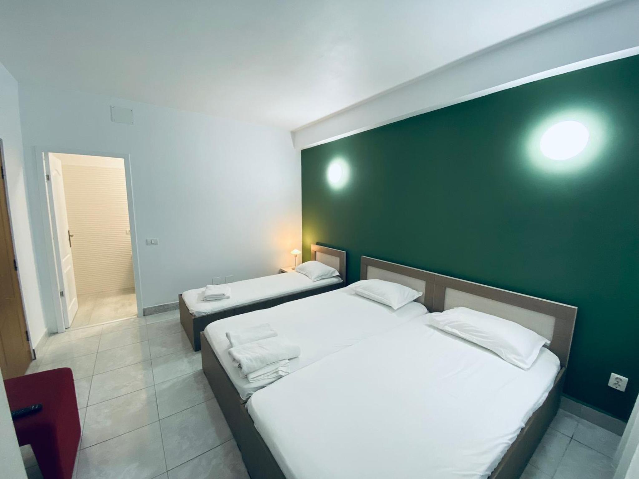 Three-Bedroom Apartment - Photo 21