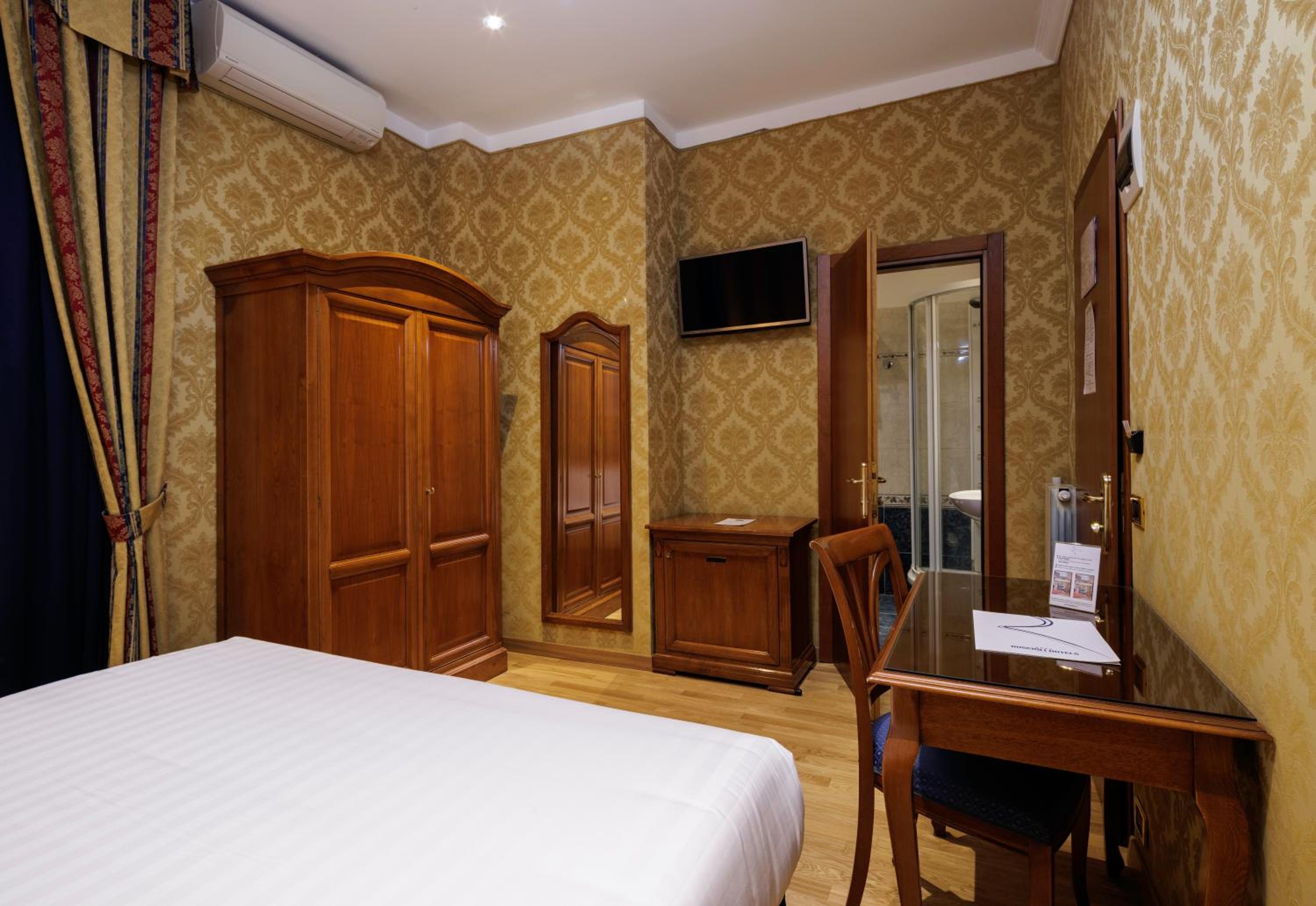 Economy room with double bed and internal window to hall