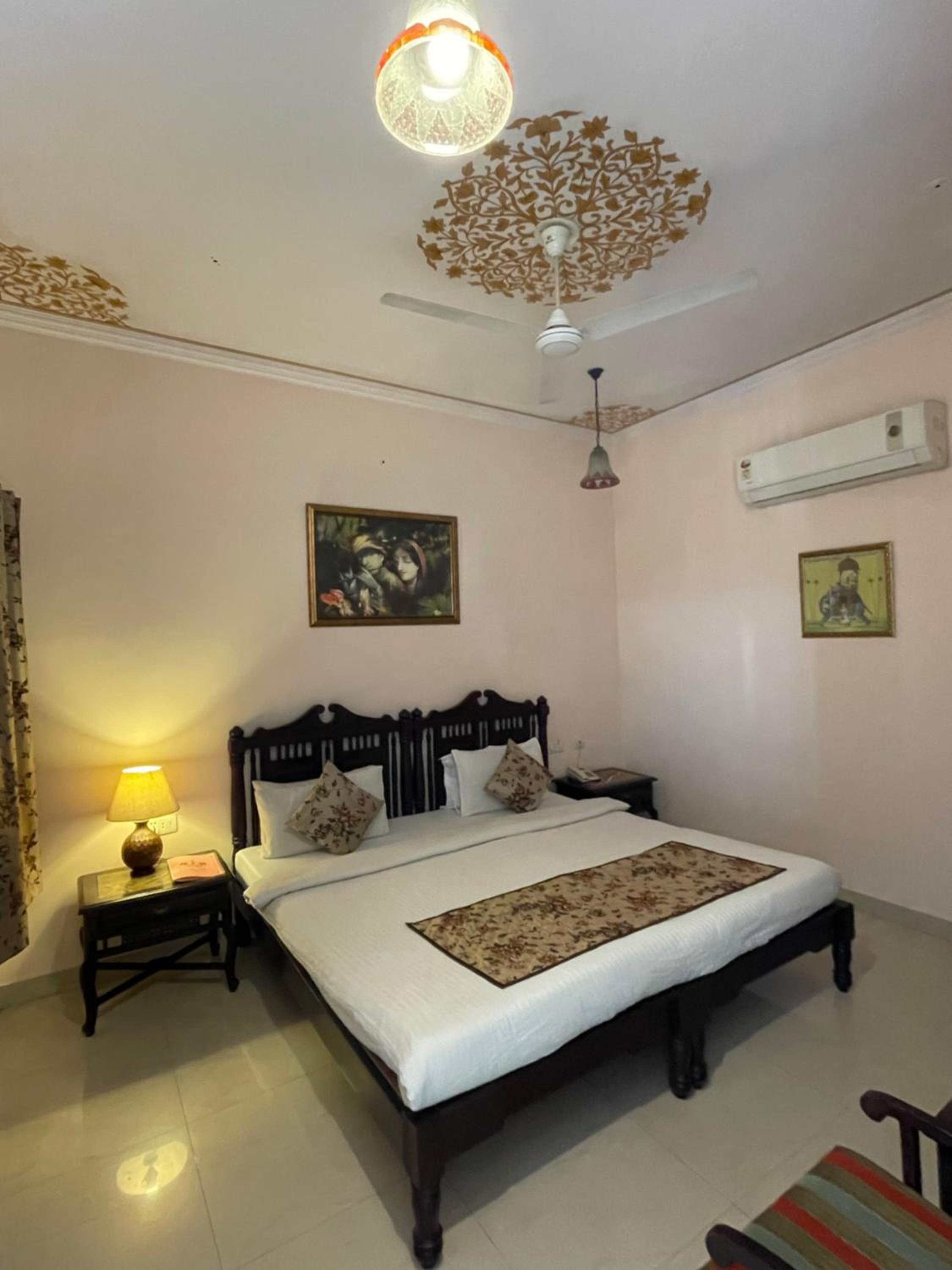 Deluxe Double with Sit-Out - Includes free pickup on arrival from airport/ train station / bus station via tuk-tuk, & a dedicated travel desk to assist with local sightseeing tours, intercity travel arrangements & activities.