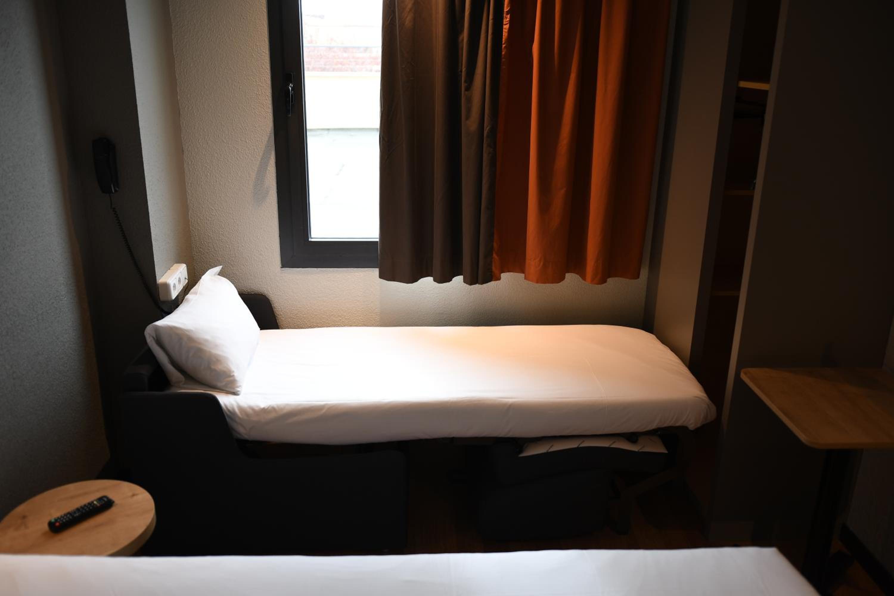 Habitación Doble con Cama Adicional para Niño