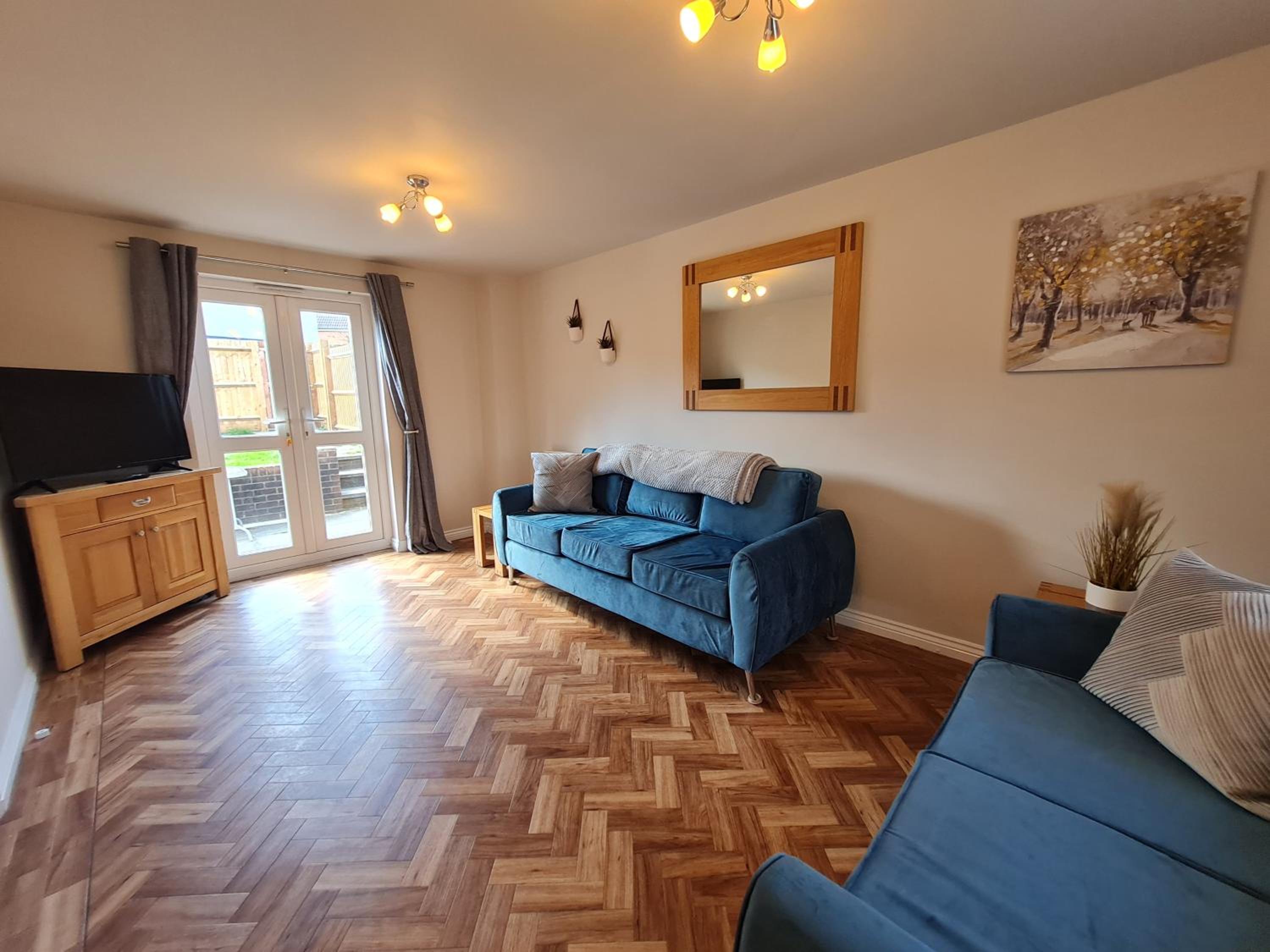 Three-Bedroom House - Photo 4