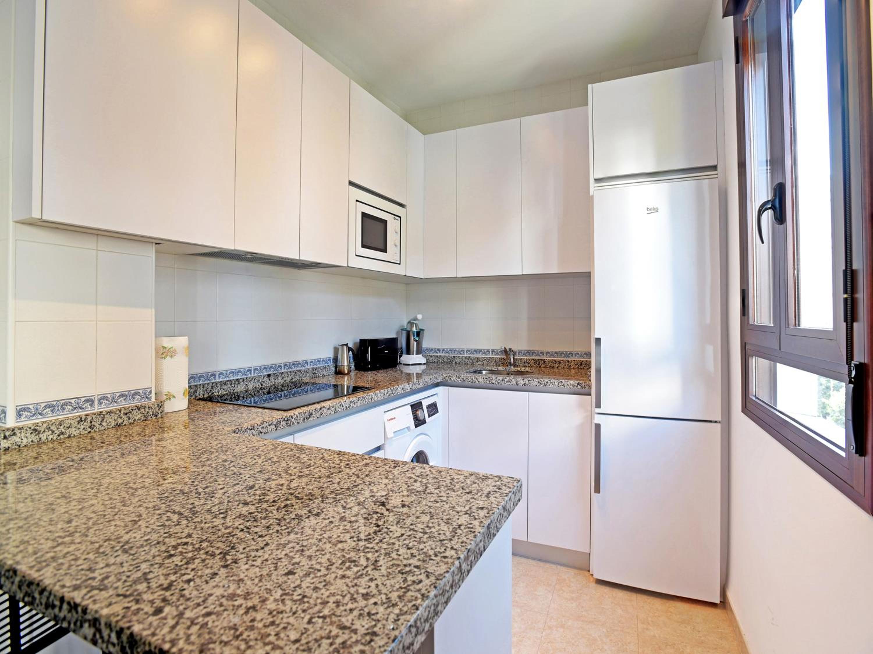 Three-Bedroom Apartment - Photo 12