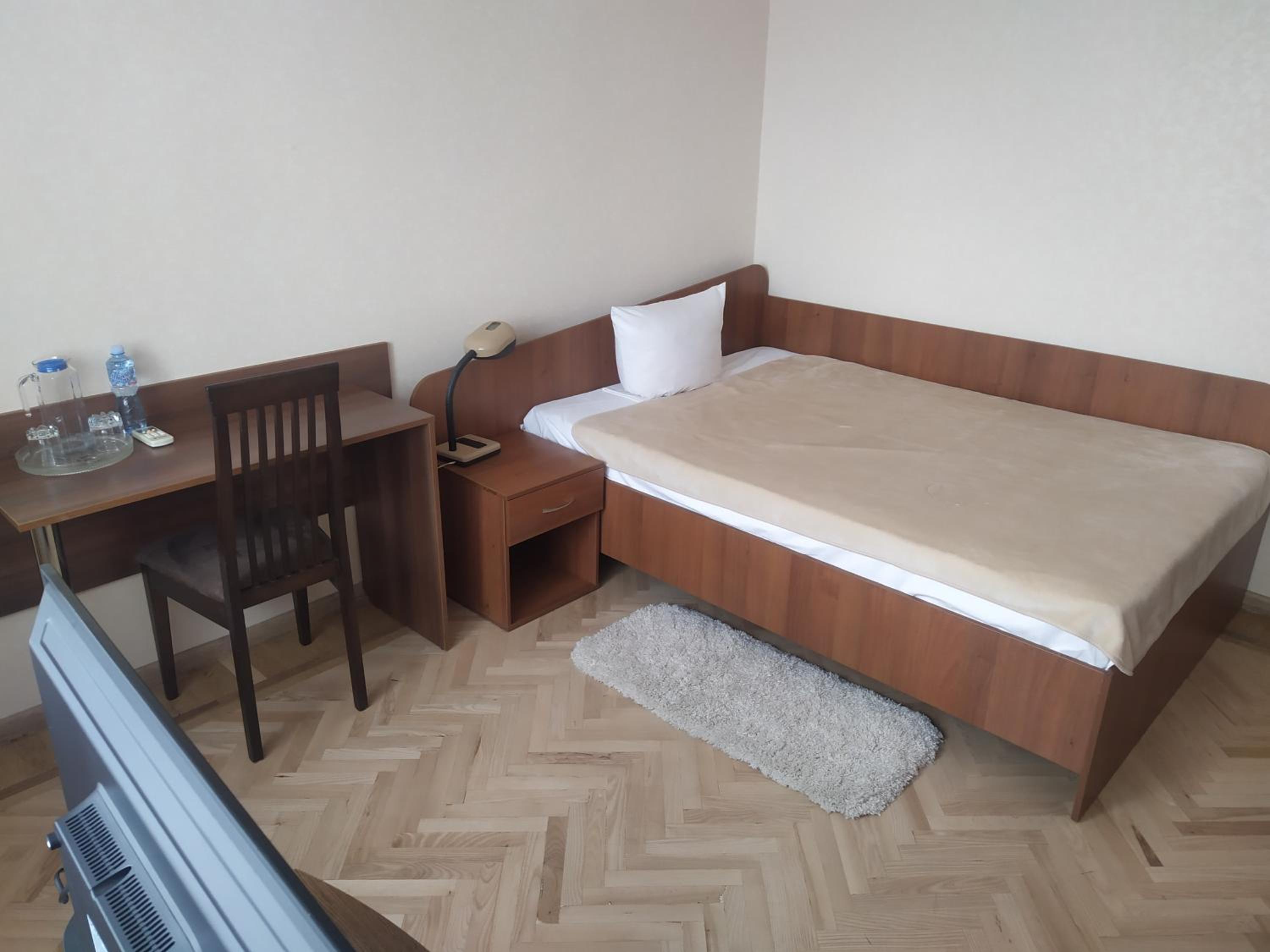 Single Room with Shared Shower and Toilet