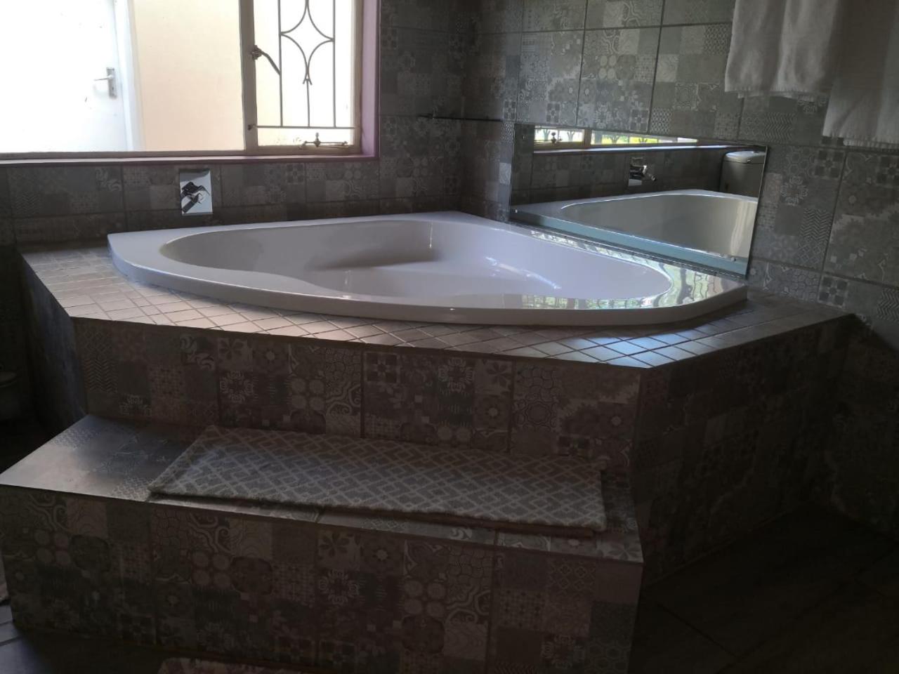 Three-Bedroom House - Photo 16