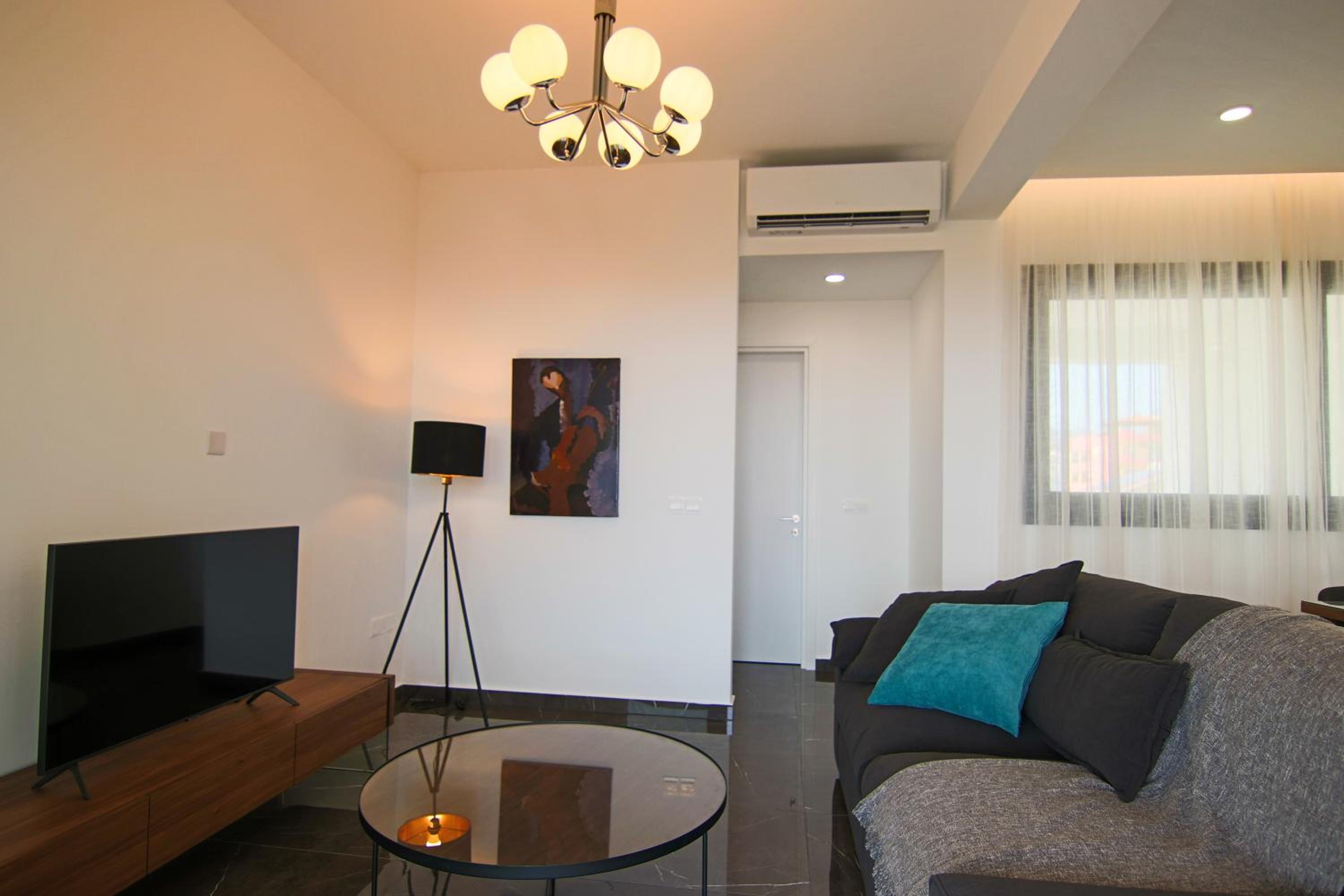 Three-Bedroom Apartment photo 2