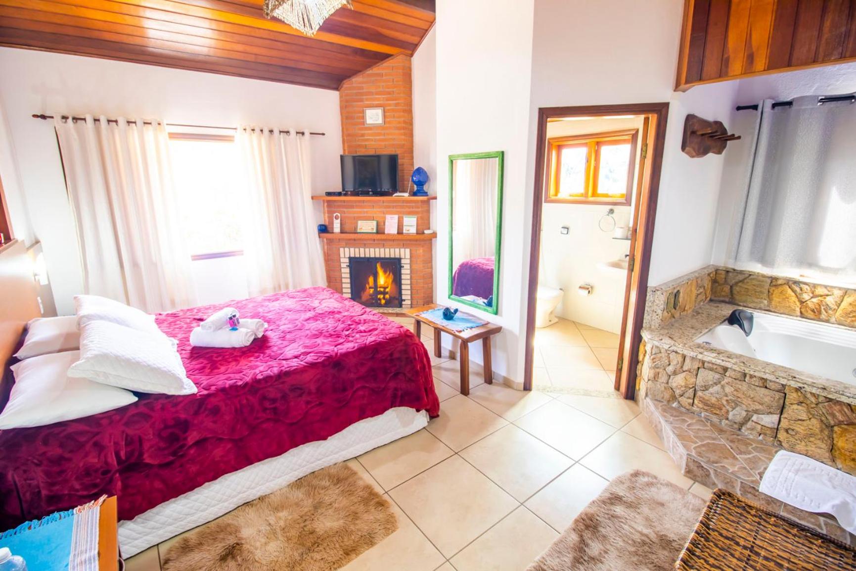 Suíte Luxo com Banheira de Hidromassagem - Photo 26