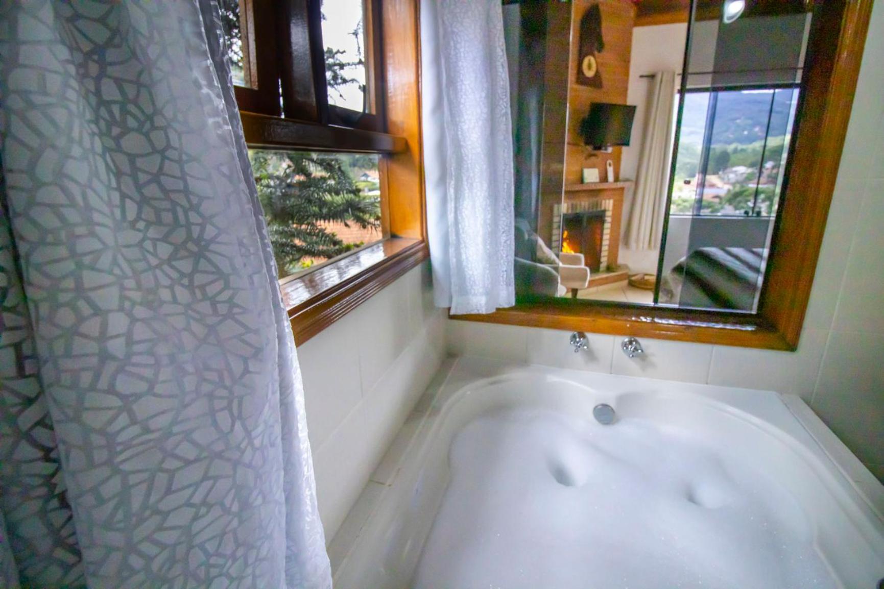 Suíte Luxo com Banheira de Hidromassagem - Photo 4