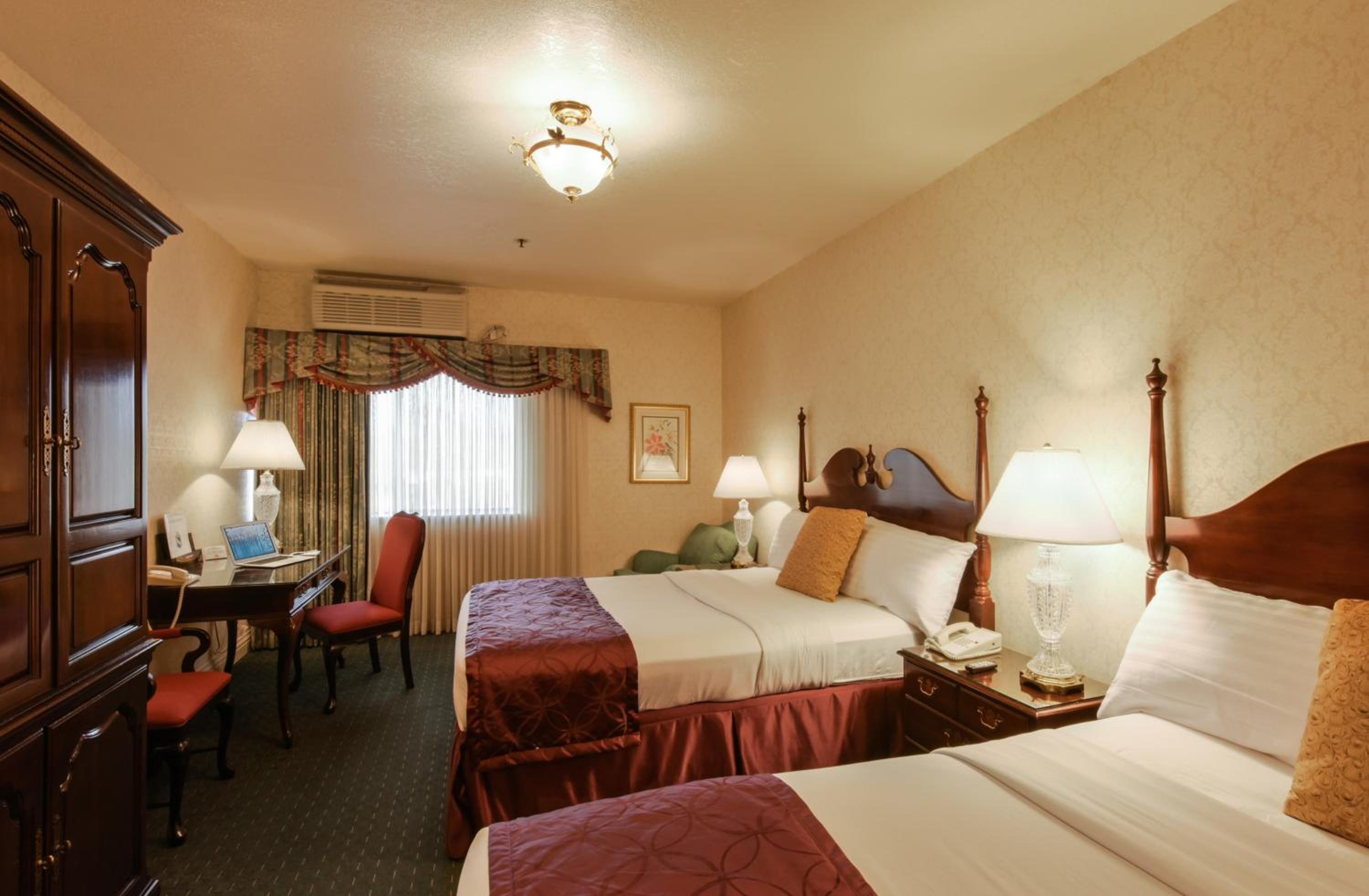 Queen Room with Two Queen Beds - Photo 1