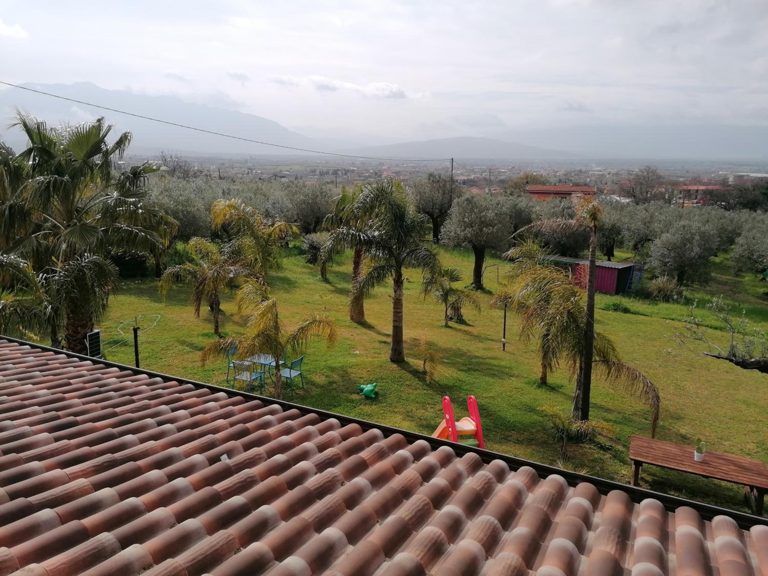 Quadruple Room with Garden View - Photo 9