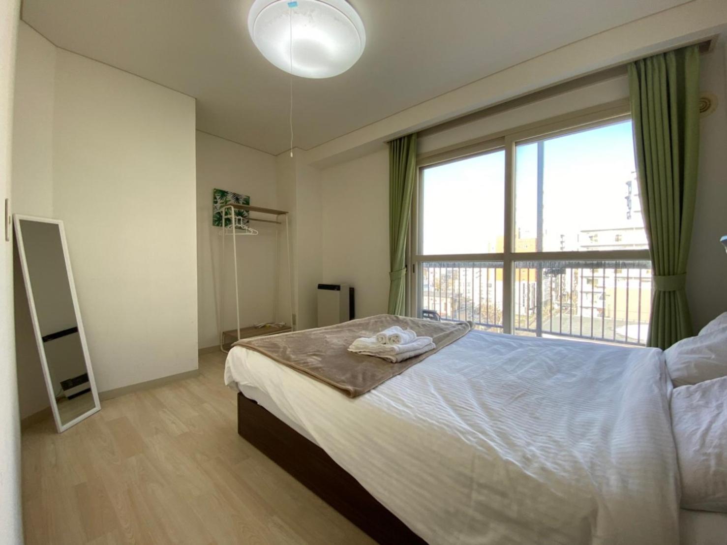 Three-Bedroom Apartment - Photo 46