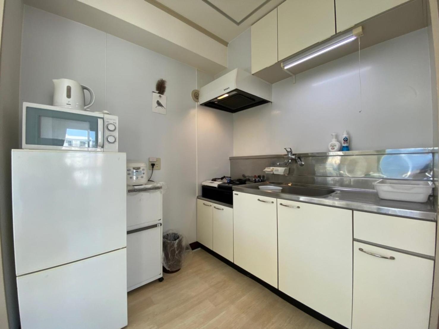 Three-Bedroom Apartment - Photo 41