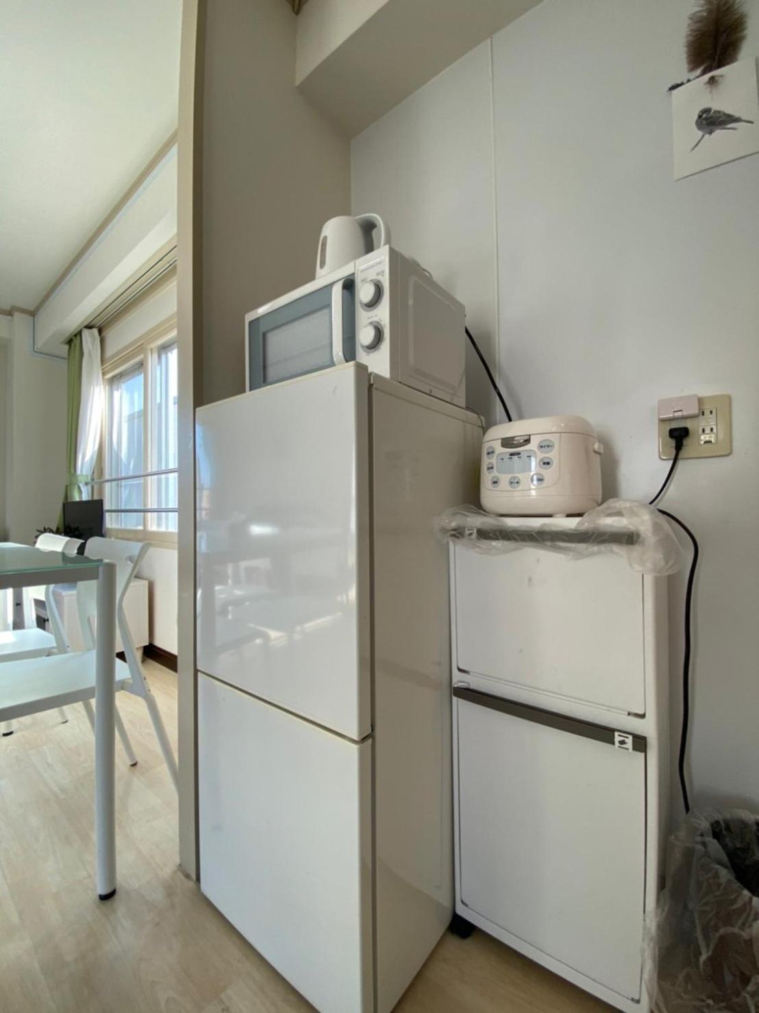 Three-Bedroom Apartment - Photo 40