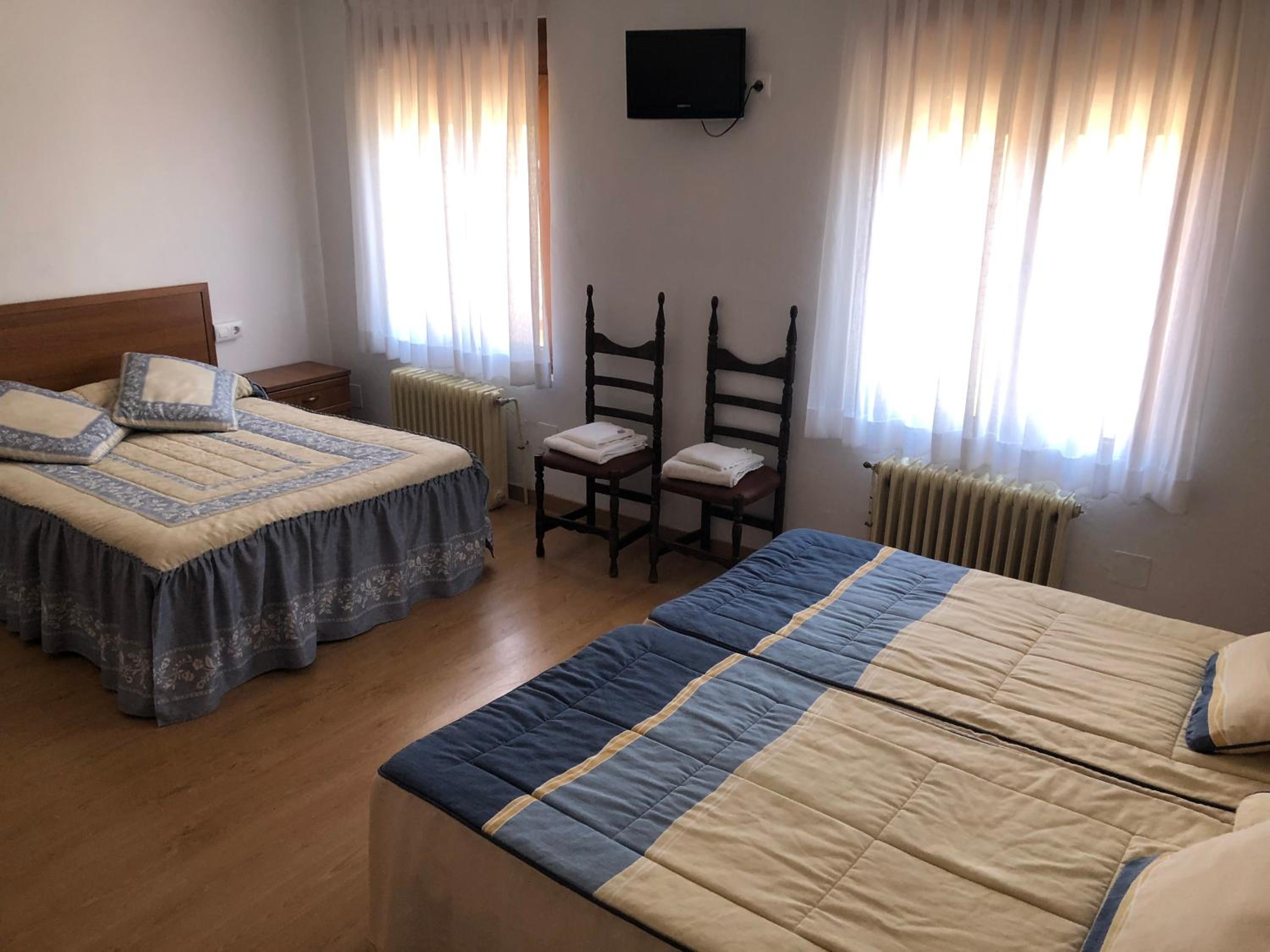 Habitación Cuádruple con Vista al Jardín