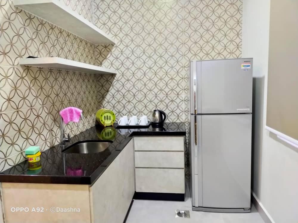 Three-Bedroom Apartment - Photo 7