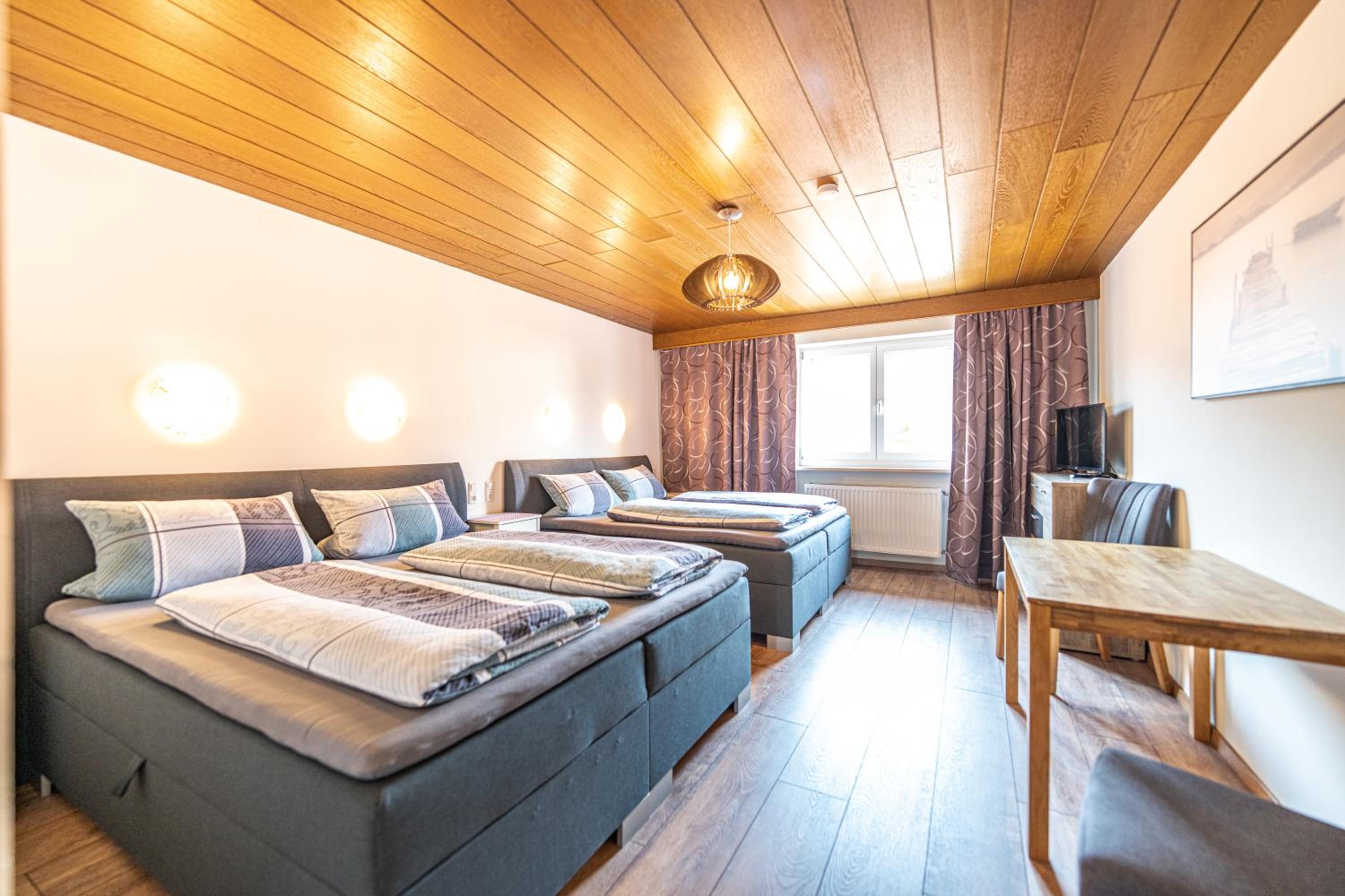 Quadruple Room with comfort box-spring bed