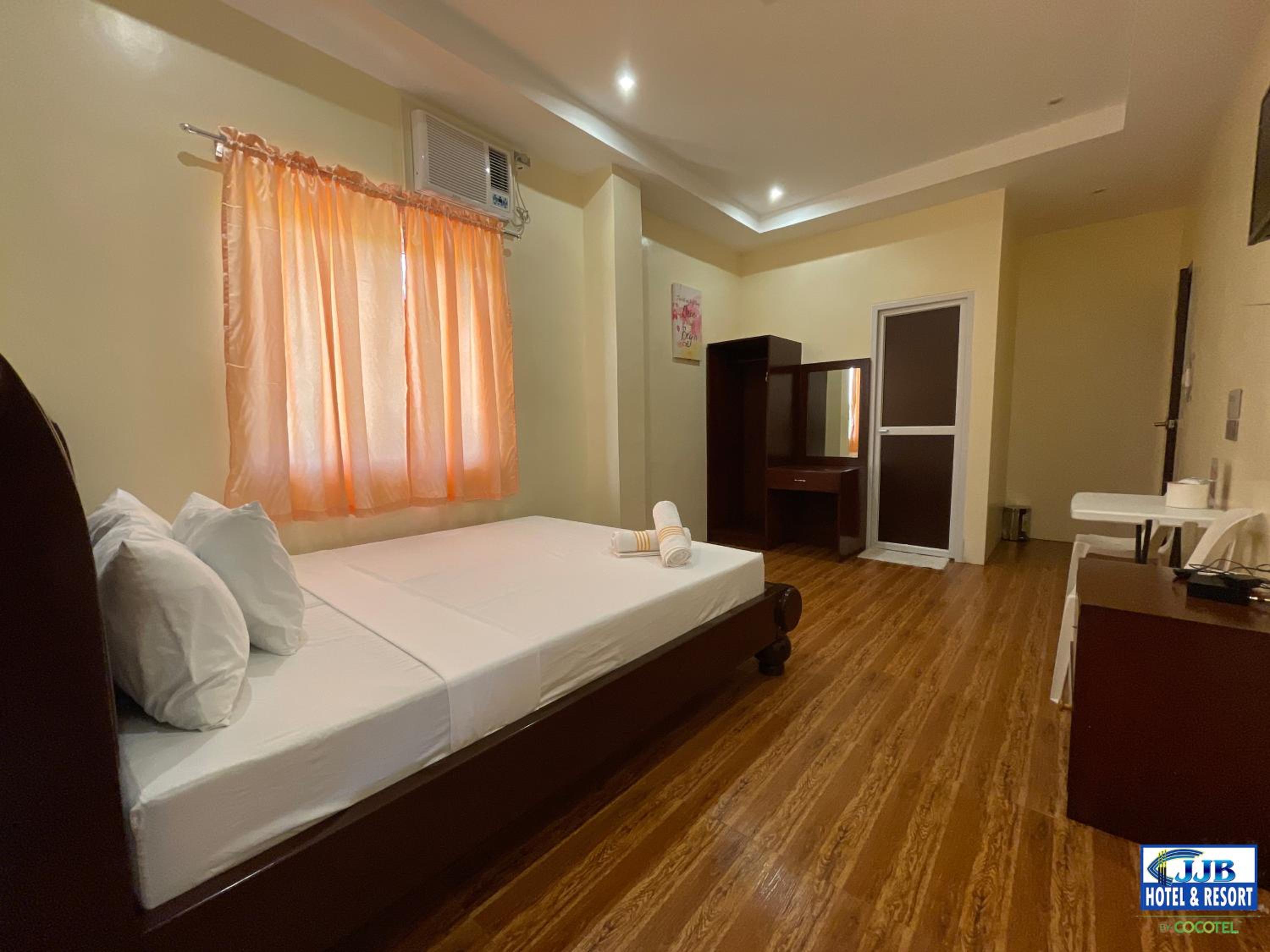 Deluxe Room - Photo 2