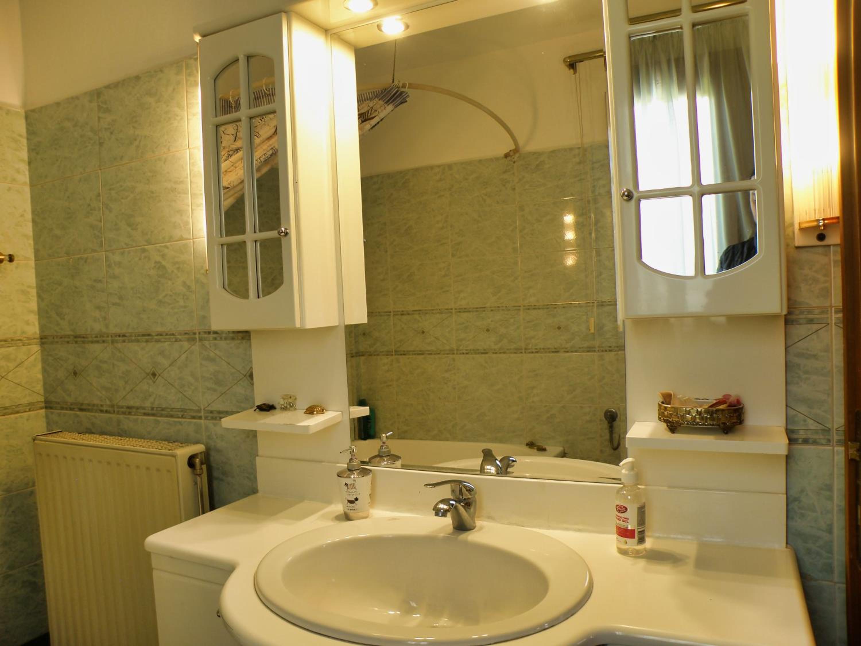 Three-Bedroom Apartment - Photo 5