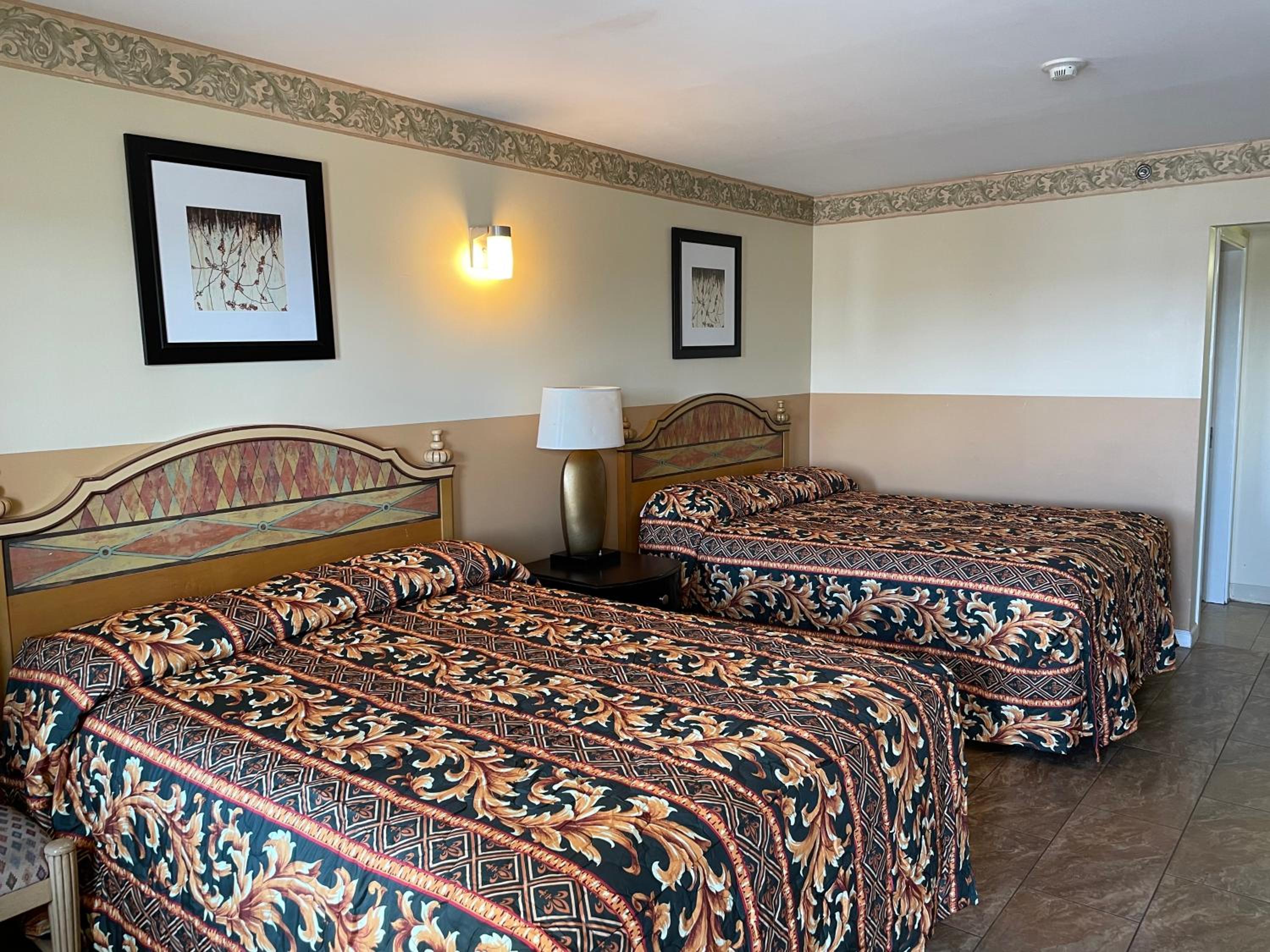 Queen Room with Two Queen Beds - Photo 1