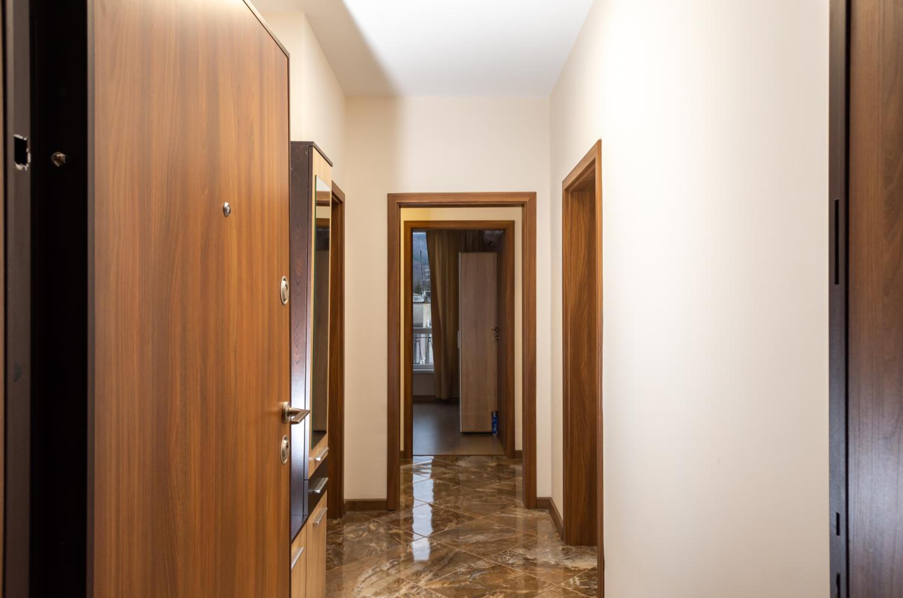 Three-Bedroom Apartment - Photo 2